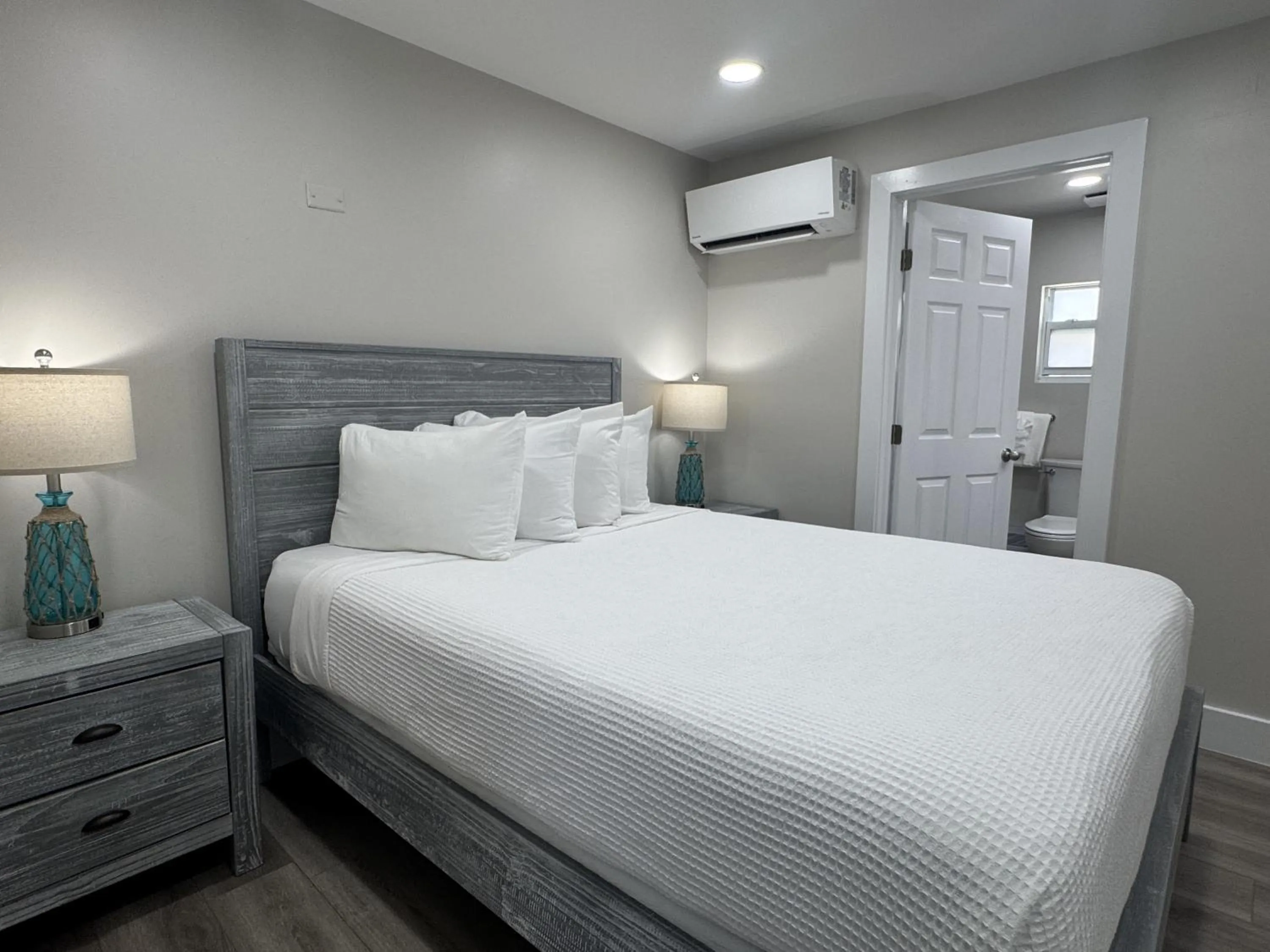 Bed in Amoray Dive Resort