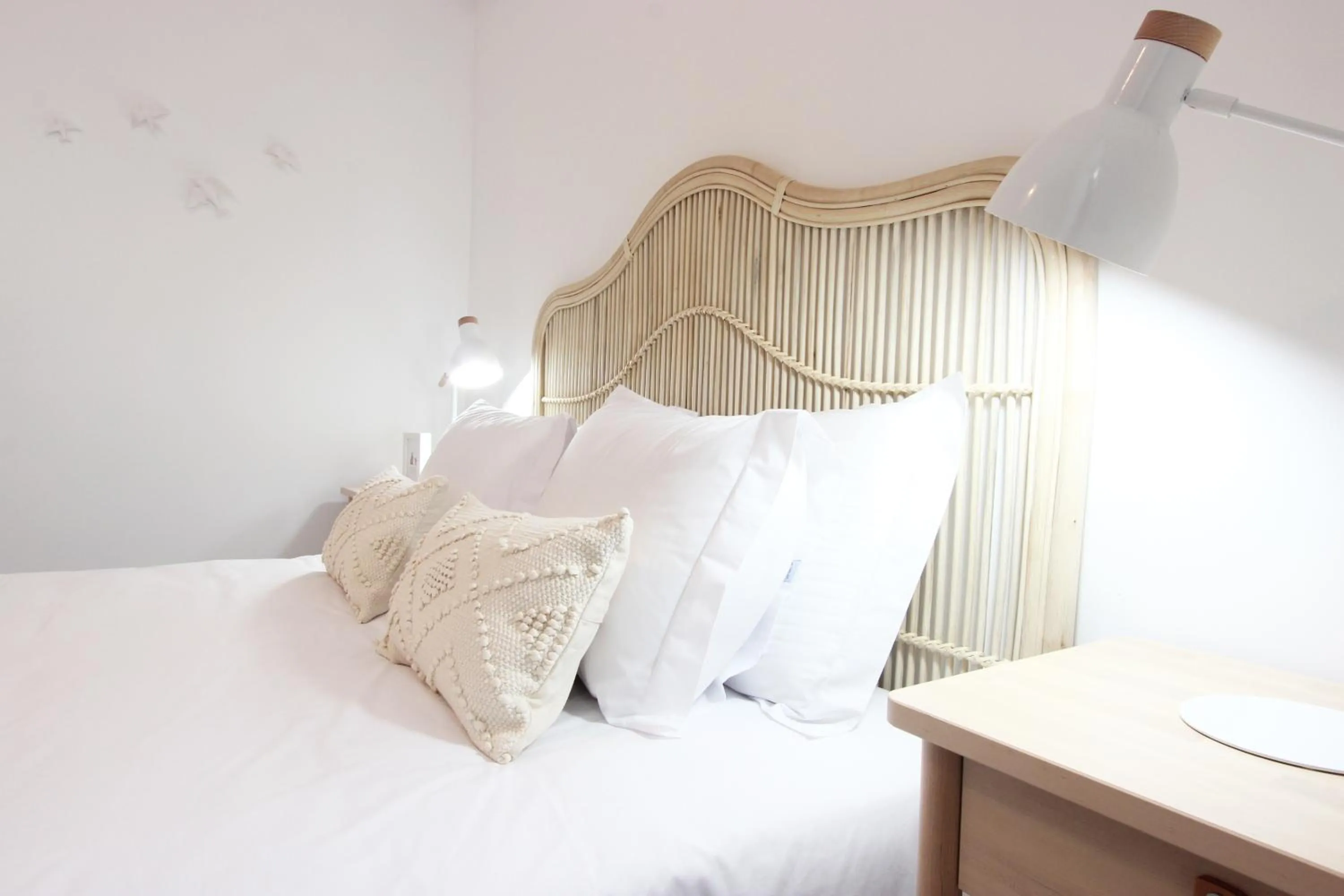 Bed in Lavradores Boutique Guesthouse