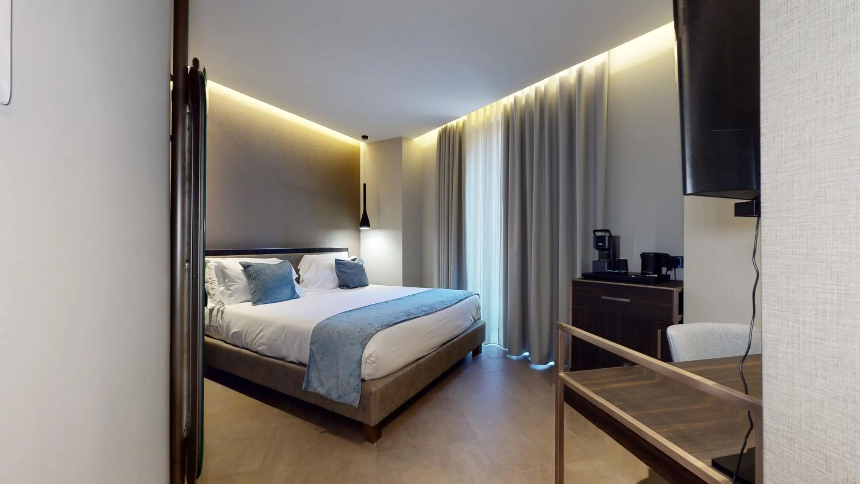 Bed in GALLERIA The Smart Boutique APARTHOTEL By OSPITAMI