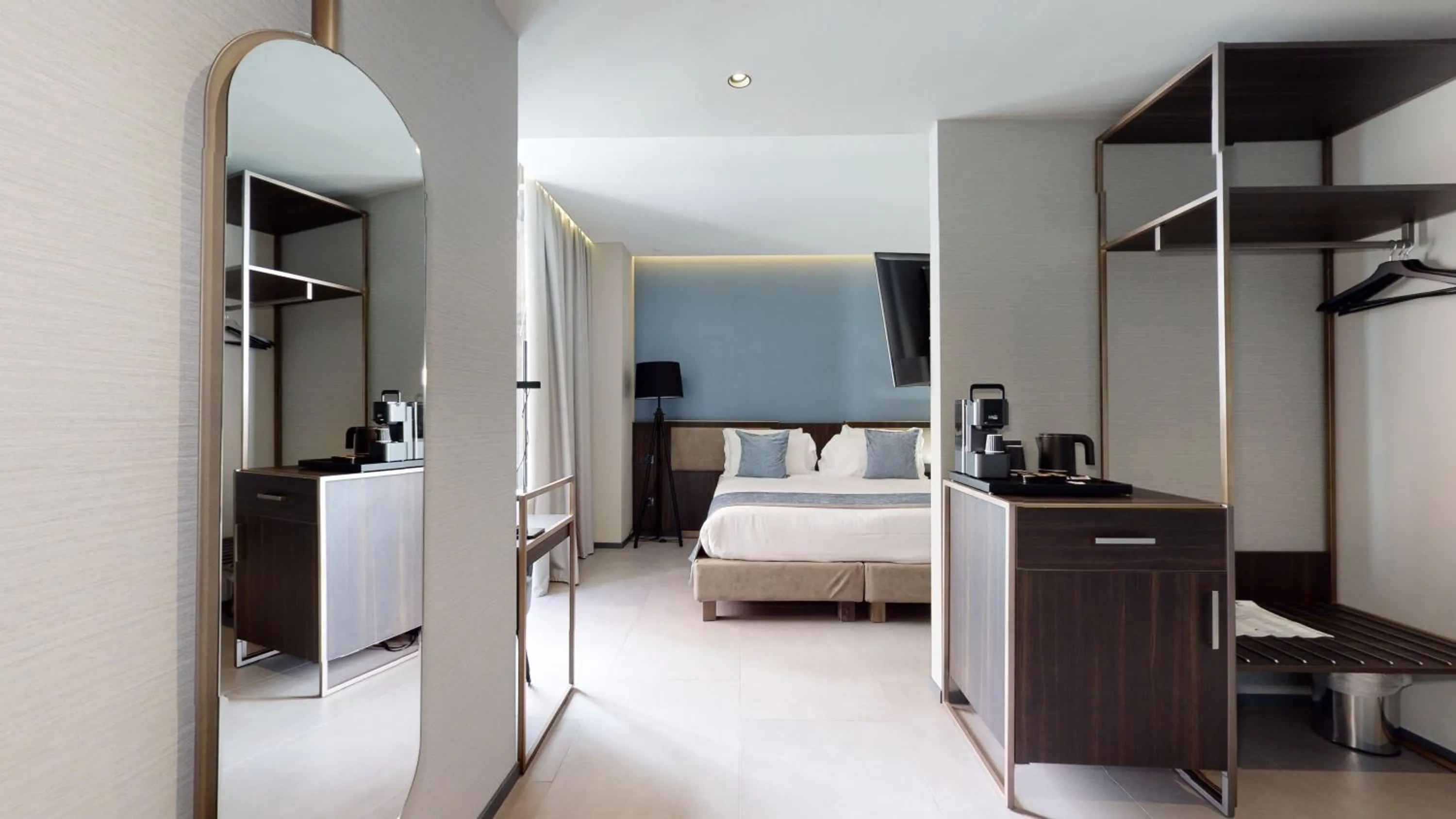 Photo of the whole room, Bed in GALLERIA The Smart Boutique APARTHOTEL By OSPITAMI