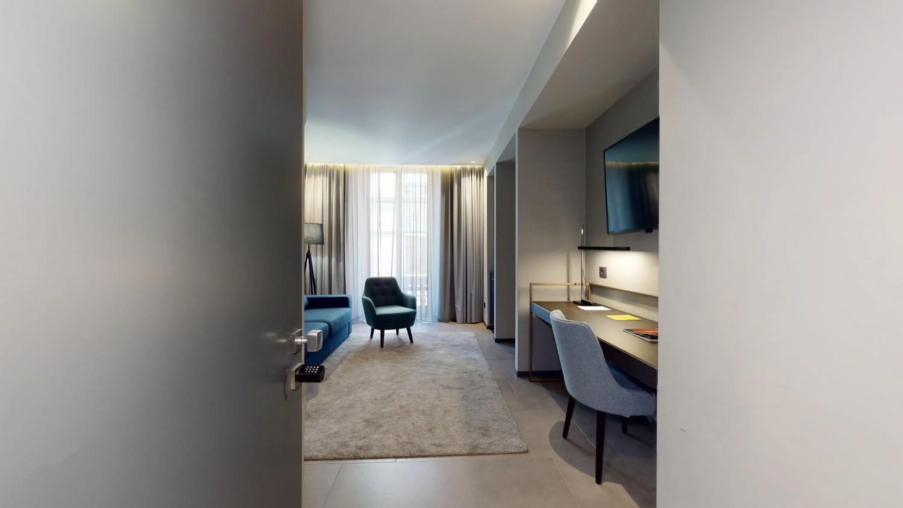 Living room, Bed in GALLERIA The Smart Boutique APARTHOTEL By OSPITAMI
