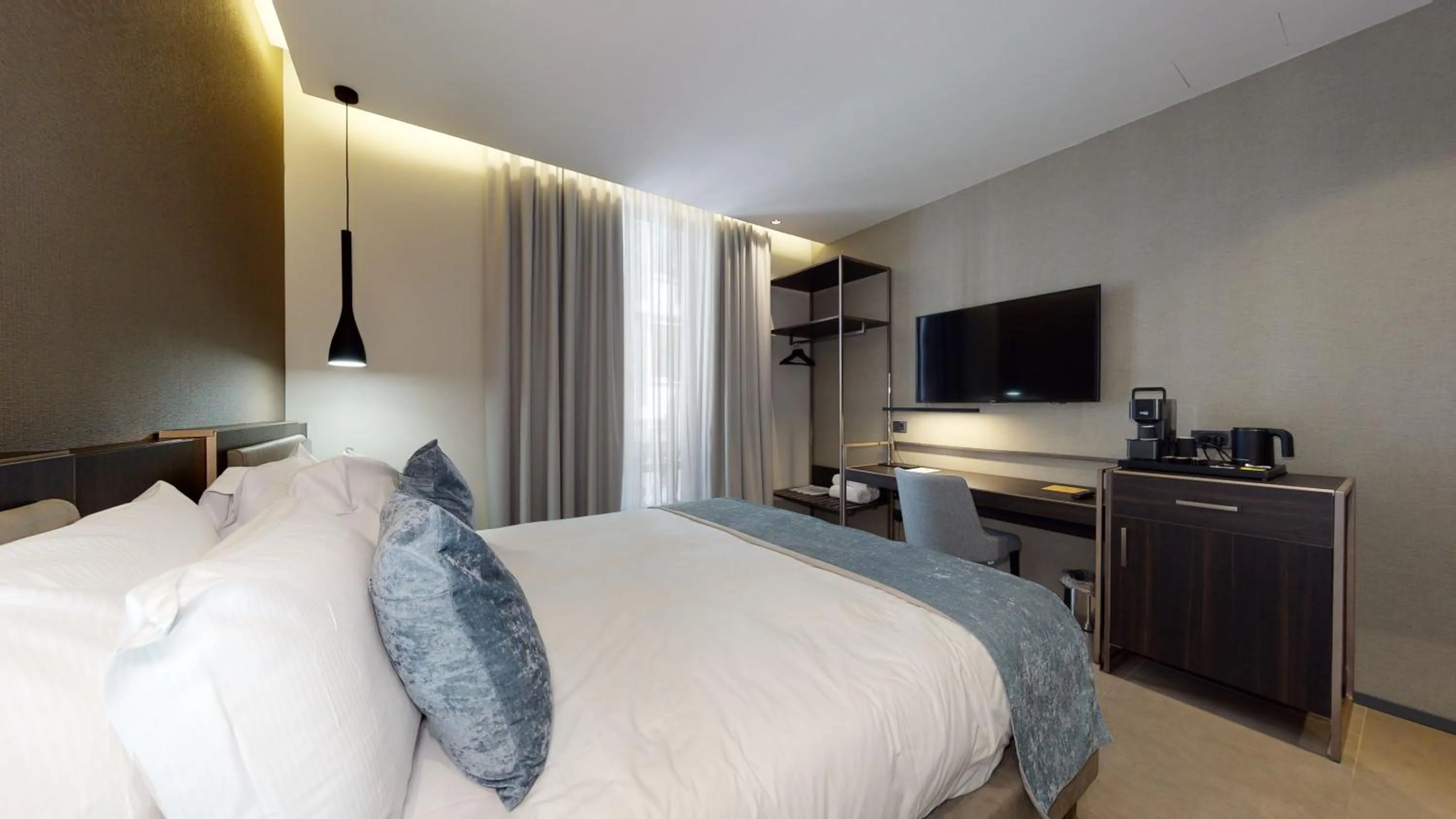 Bed in GALLERIA The Smart Boutique APARTHOTEL By OSPITAMI