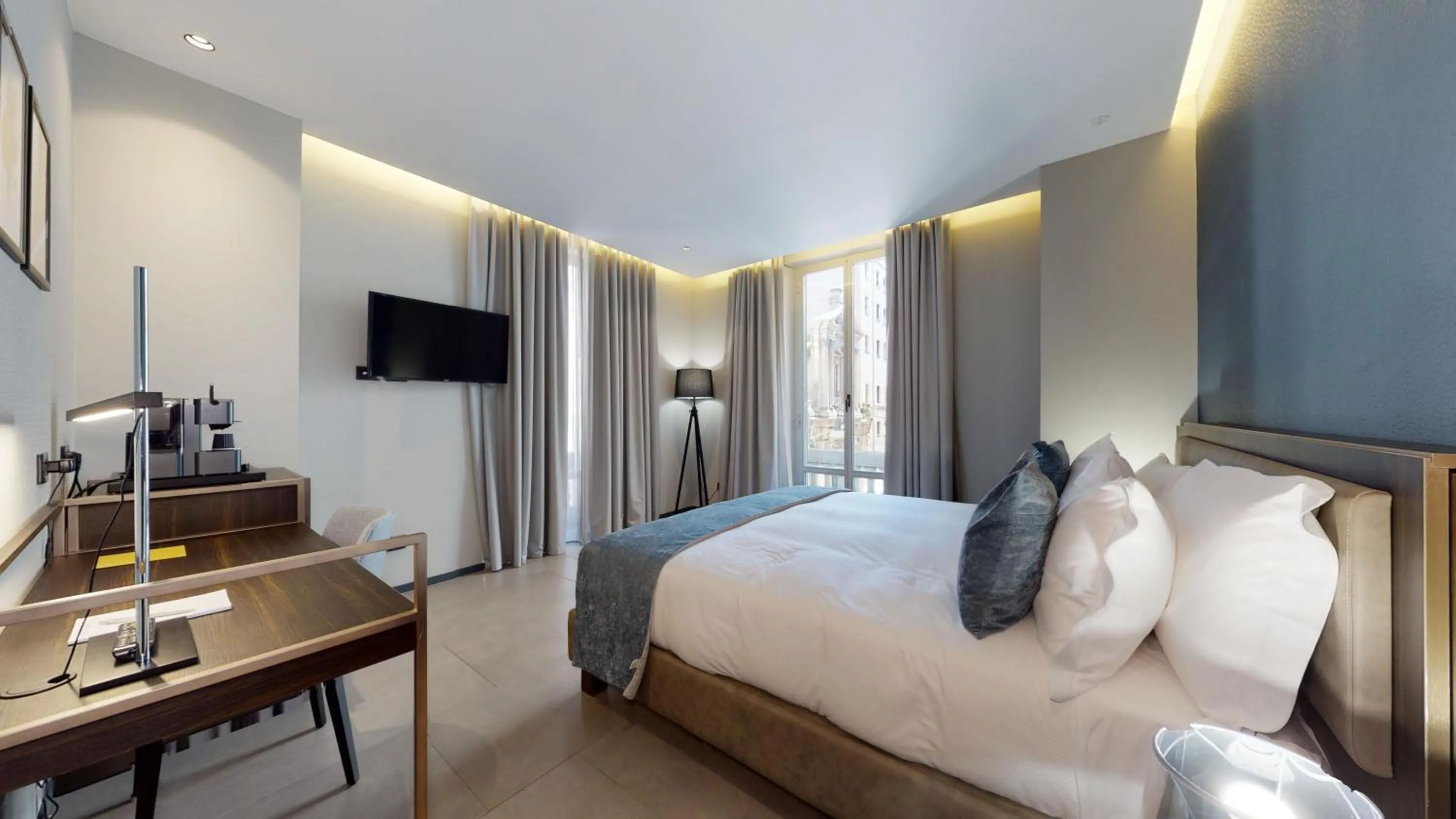 Bed in GALLERIA The Smart Boutique APARTHOTEL By OSPITAMI