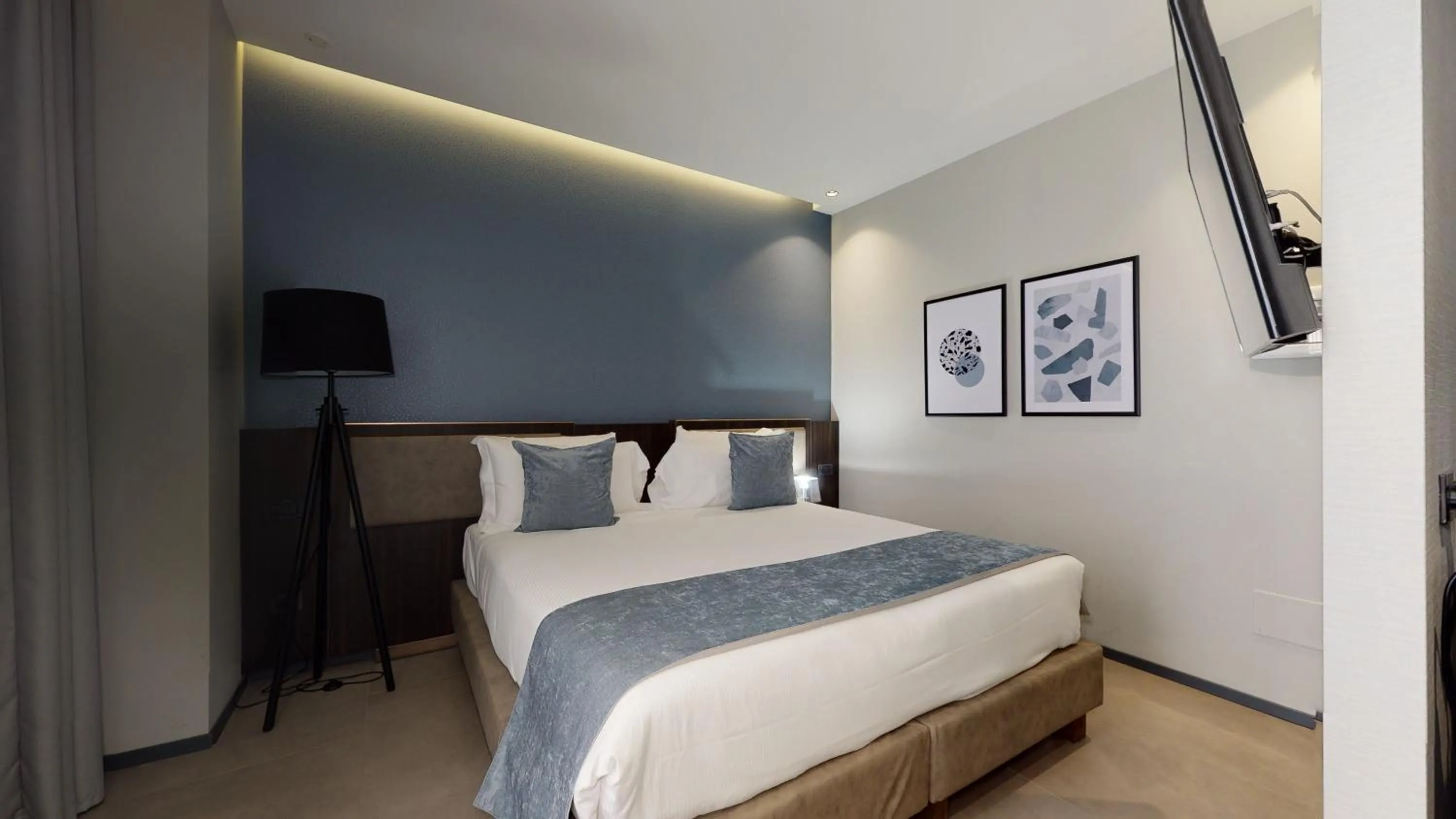 Bed in GALLERIA The Smart Boutique APARTHOTEL By OSPITAMI