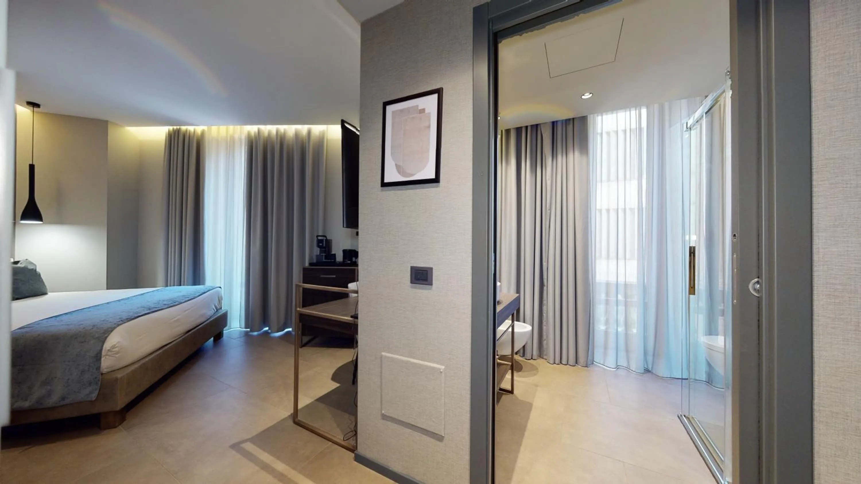 Bed in GALLERIA The Smart Boutique APARTHOTEL By OSPITAMI
