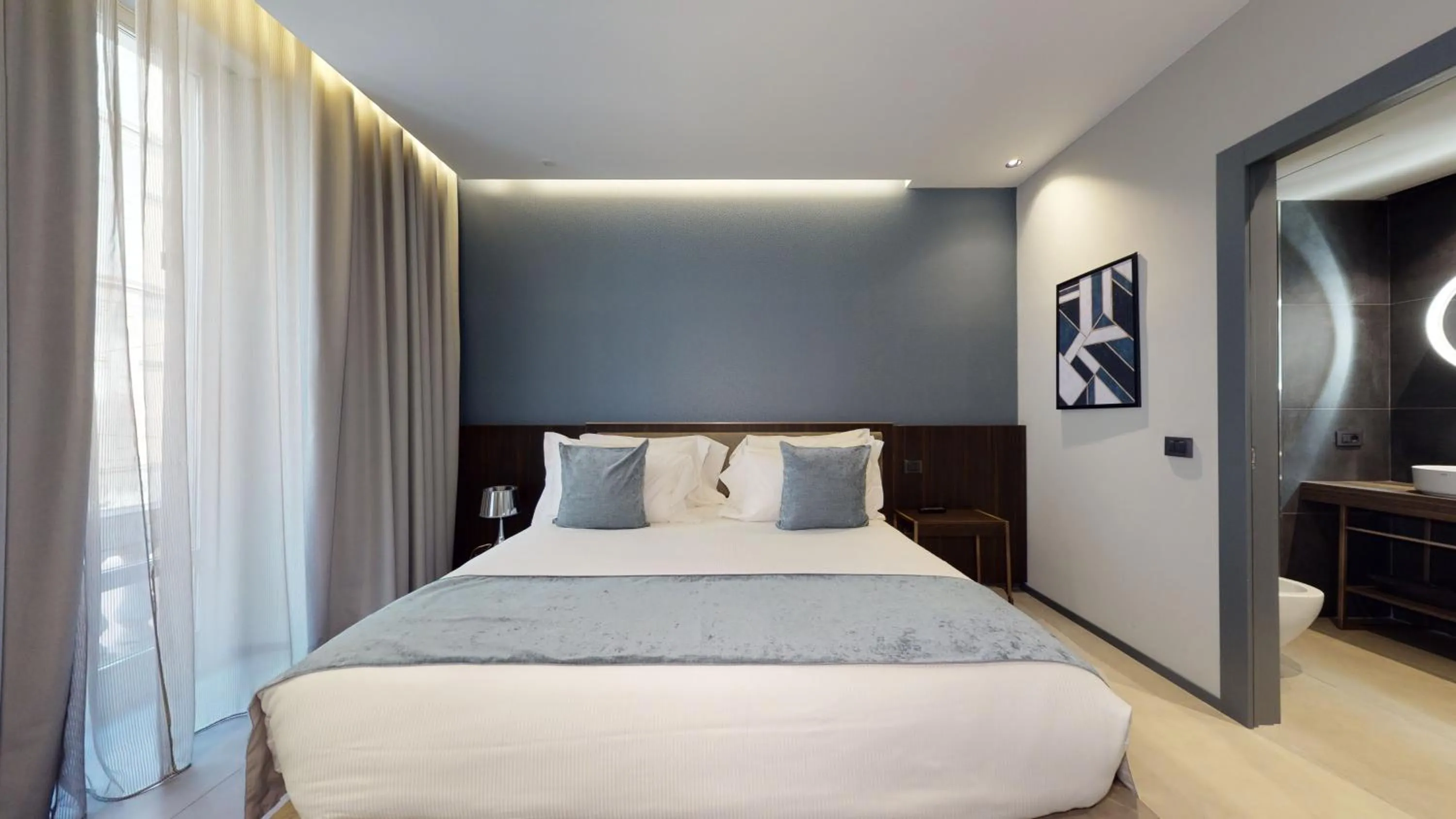 Bed in GALLERIA The Smart Boutique APARTHOTEL By OSPITAMI