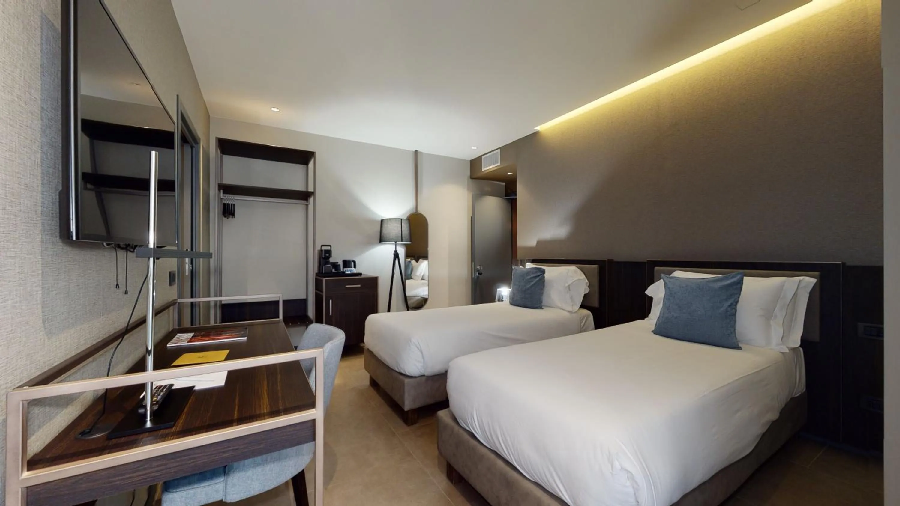 Photo of the whole room, Bed in GALLERIA The Smart Boutique APARTHOTEL By OSPITAMI