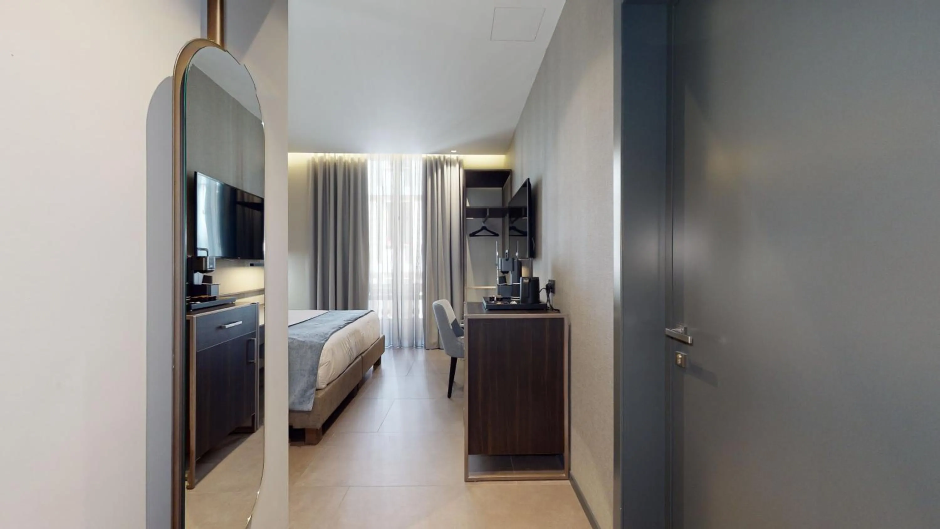 Seating area, Bed in GALLERIA The Smart Boutique APARTHOTEL By OSPITAMI