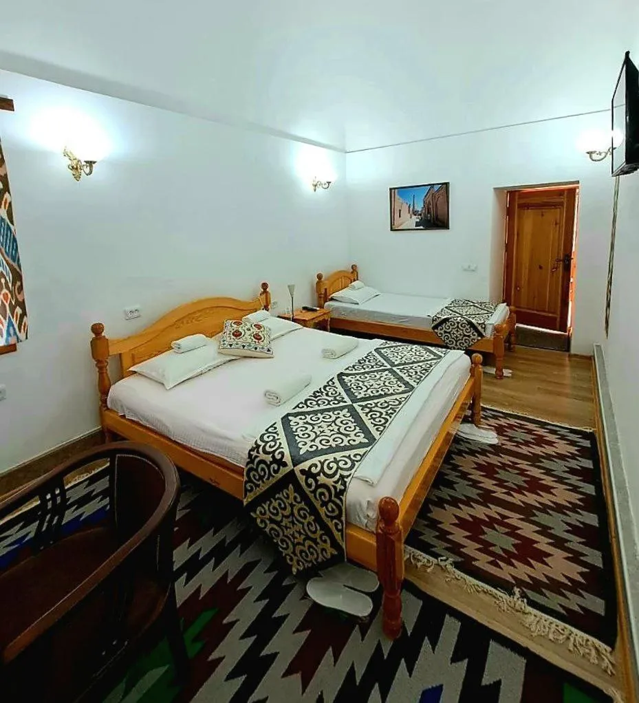 Bed in madrasah Polvon-Qori boutique hotel XIX century