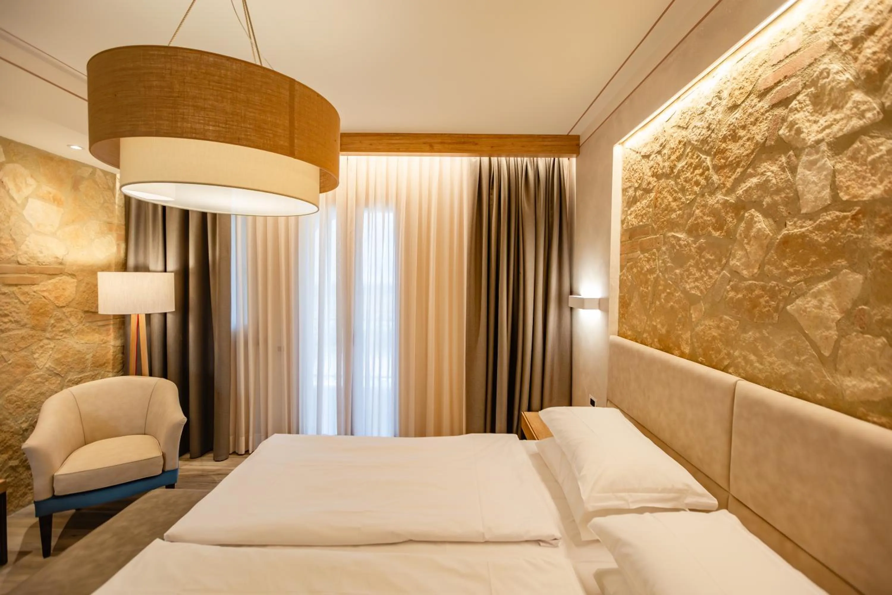 Living room, Bed in Agrihotel Elisabetta