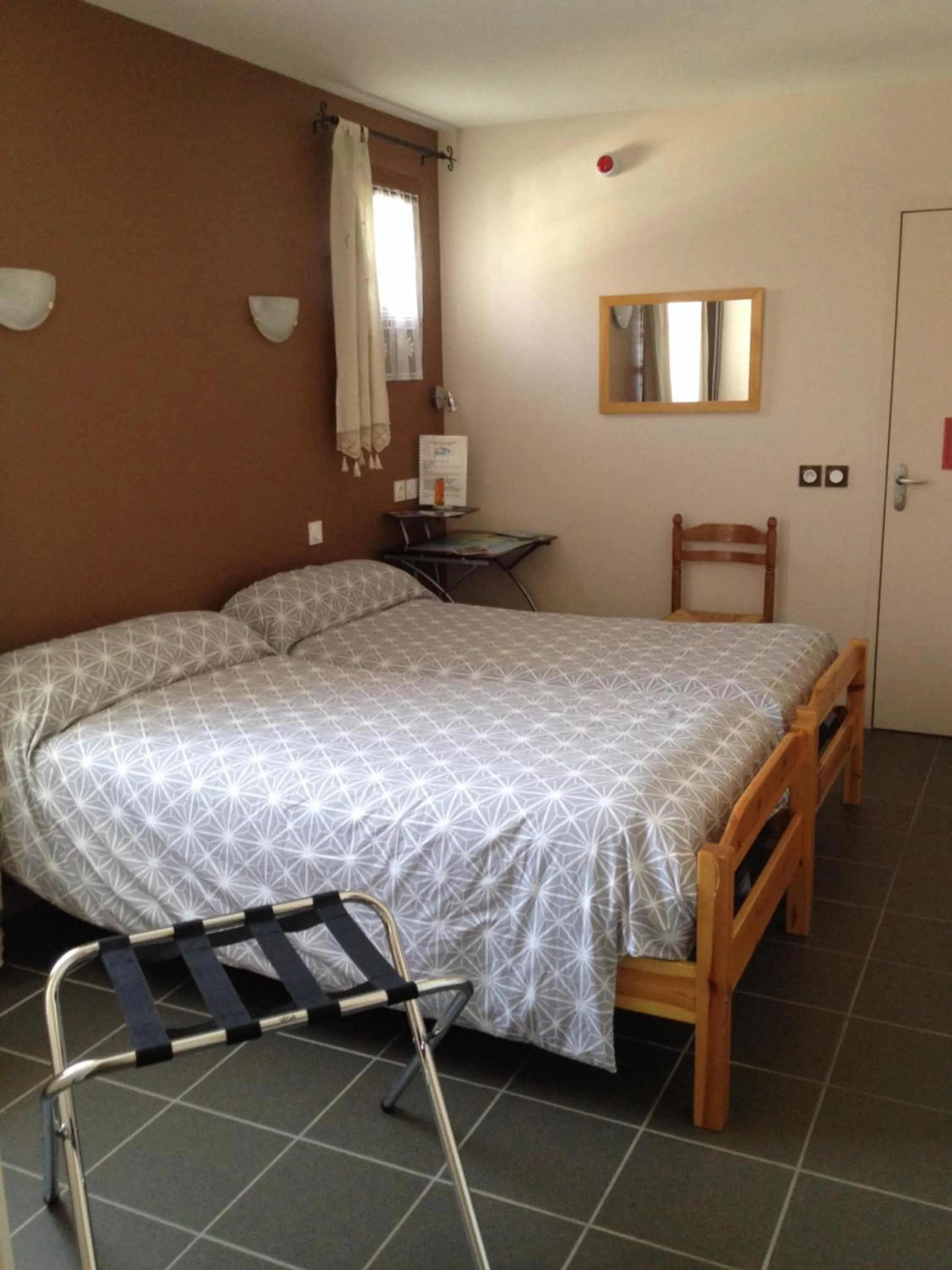 Bed in Auberge des Pyrénées