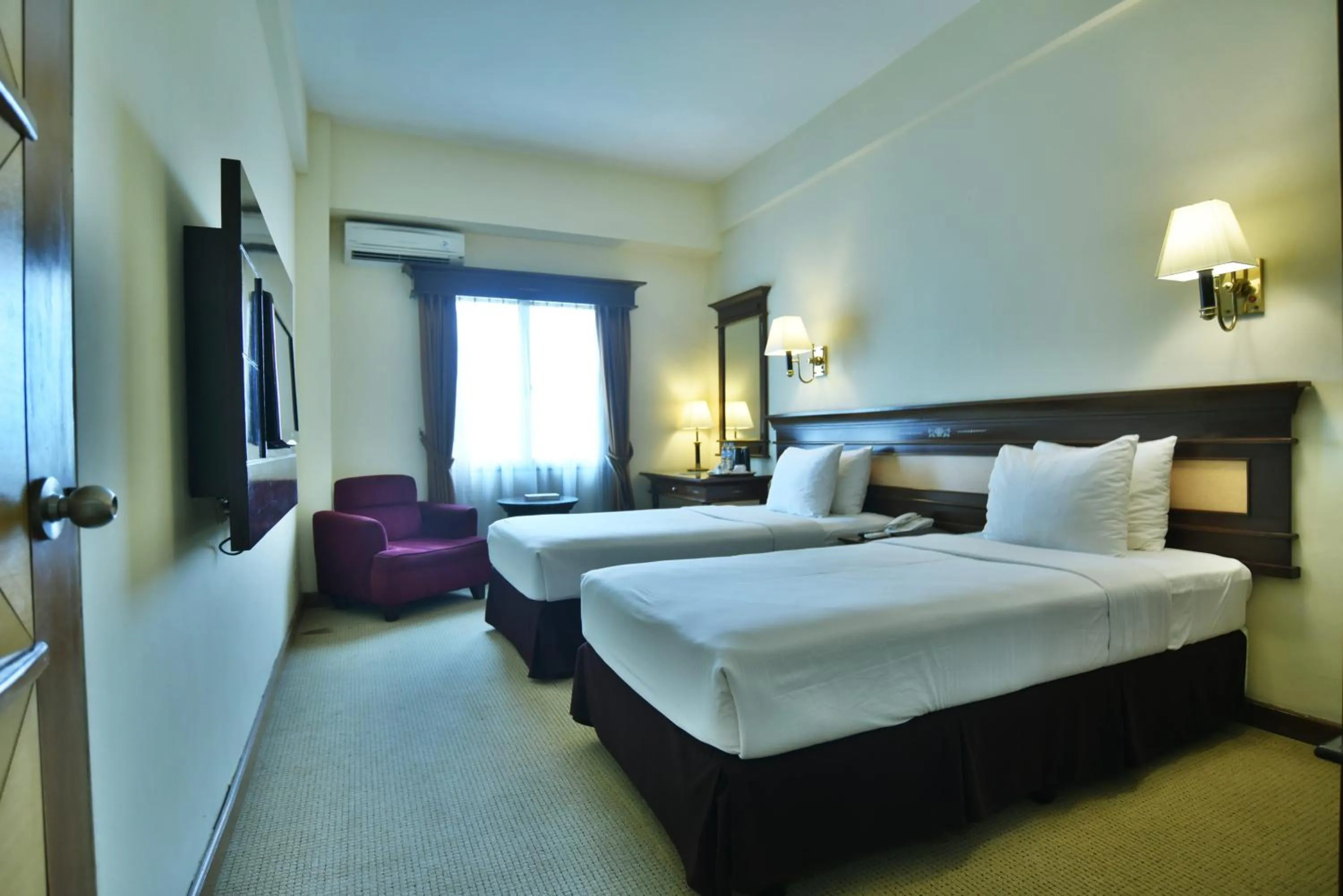 Photo of the whole room, Bed in Mega Anggrek Hotel Jakarta Slipi