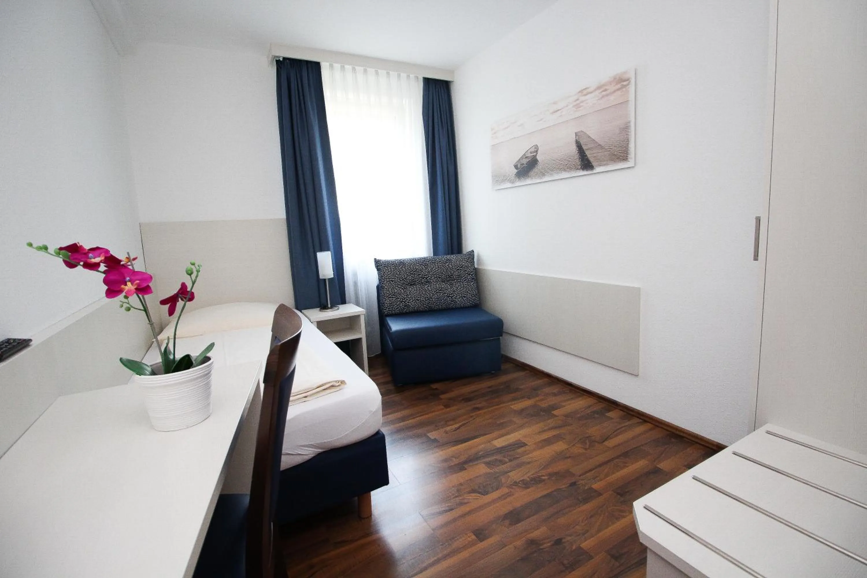 Bed in Hotel Olympia