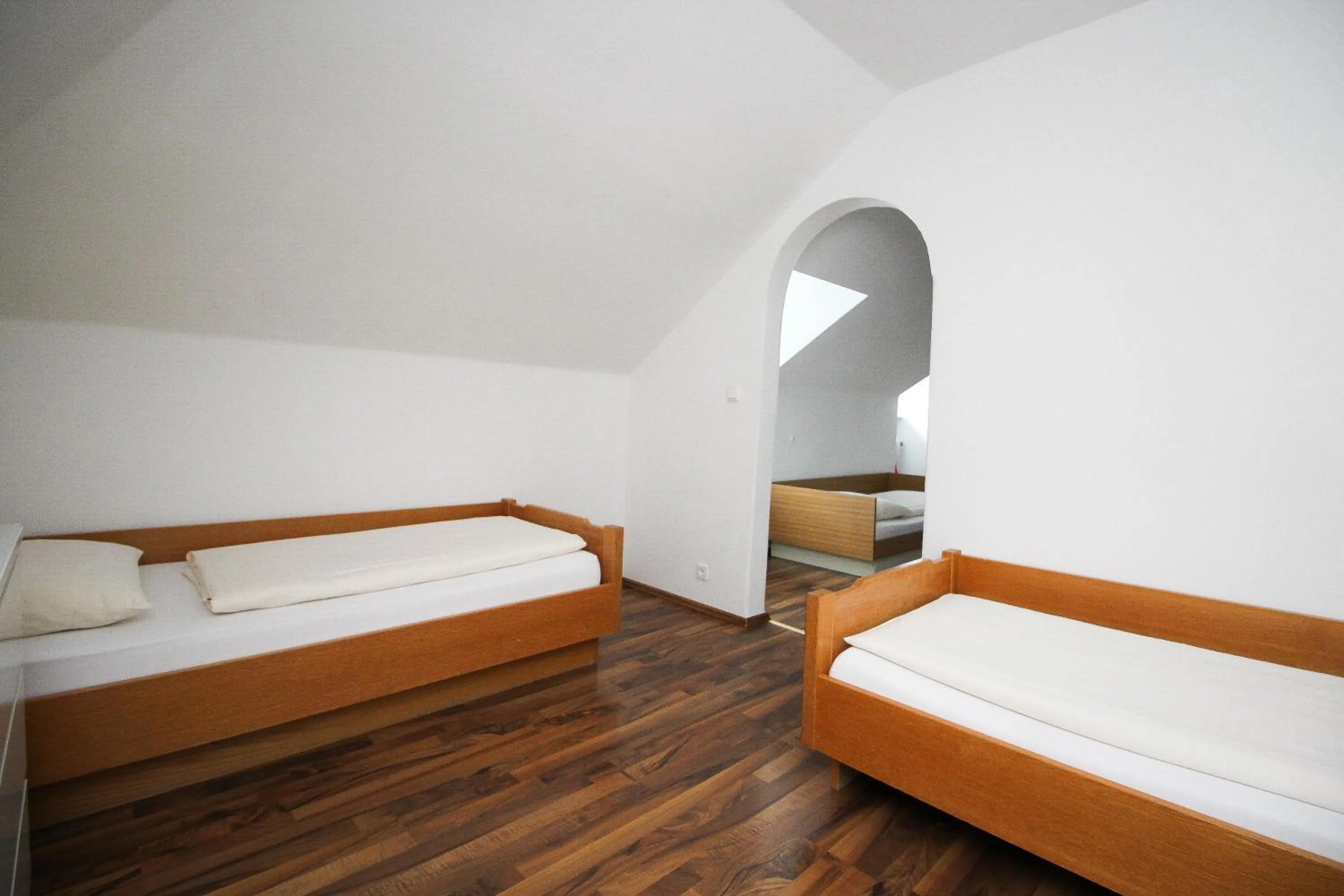 Bed in Hotel Olympia