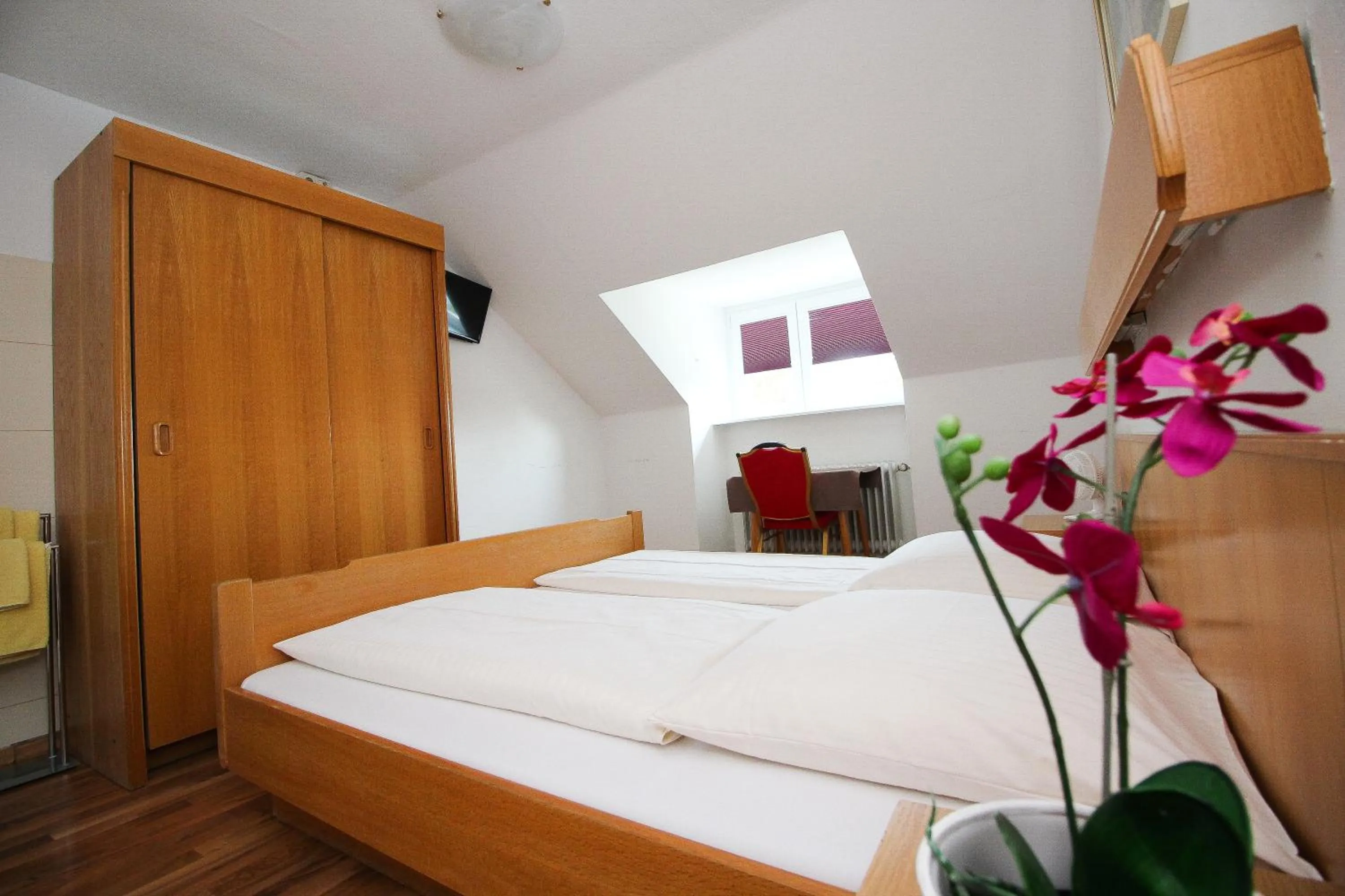 Bed in Hotel Olympia