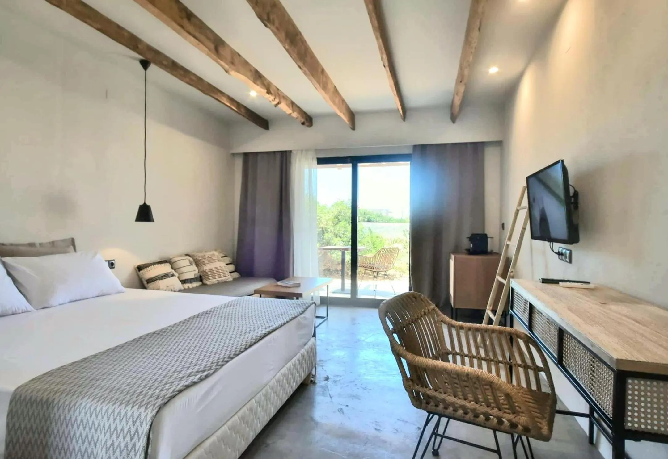 Bed in Mira Living Concept Suites Adults Only