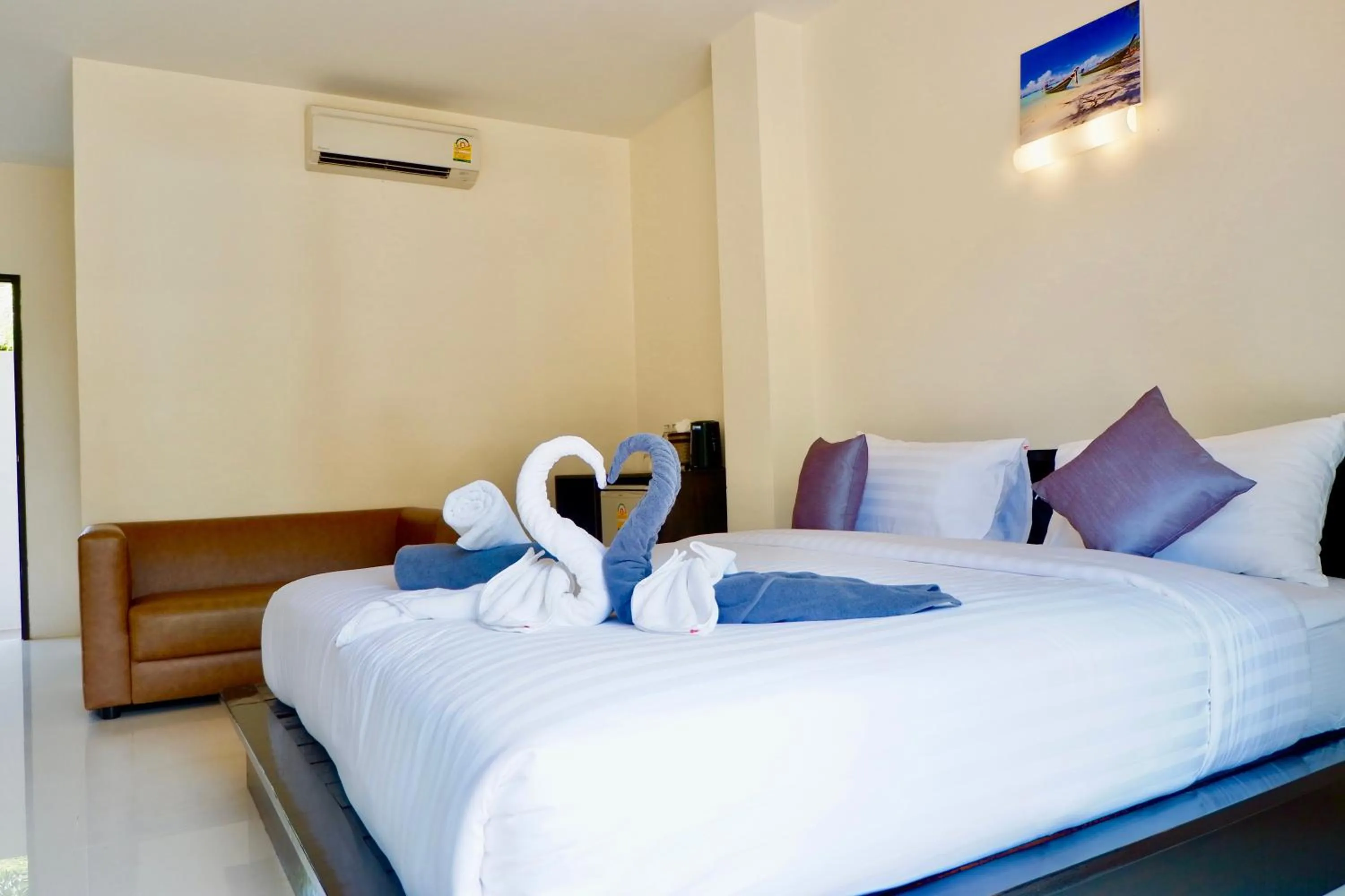 Bed in Aiya Resort Koh-Tao