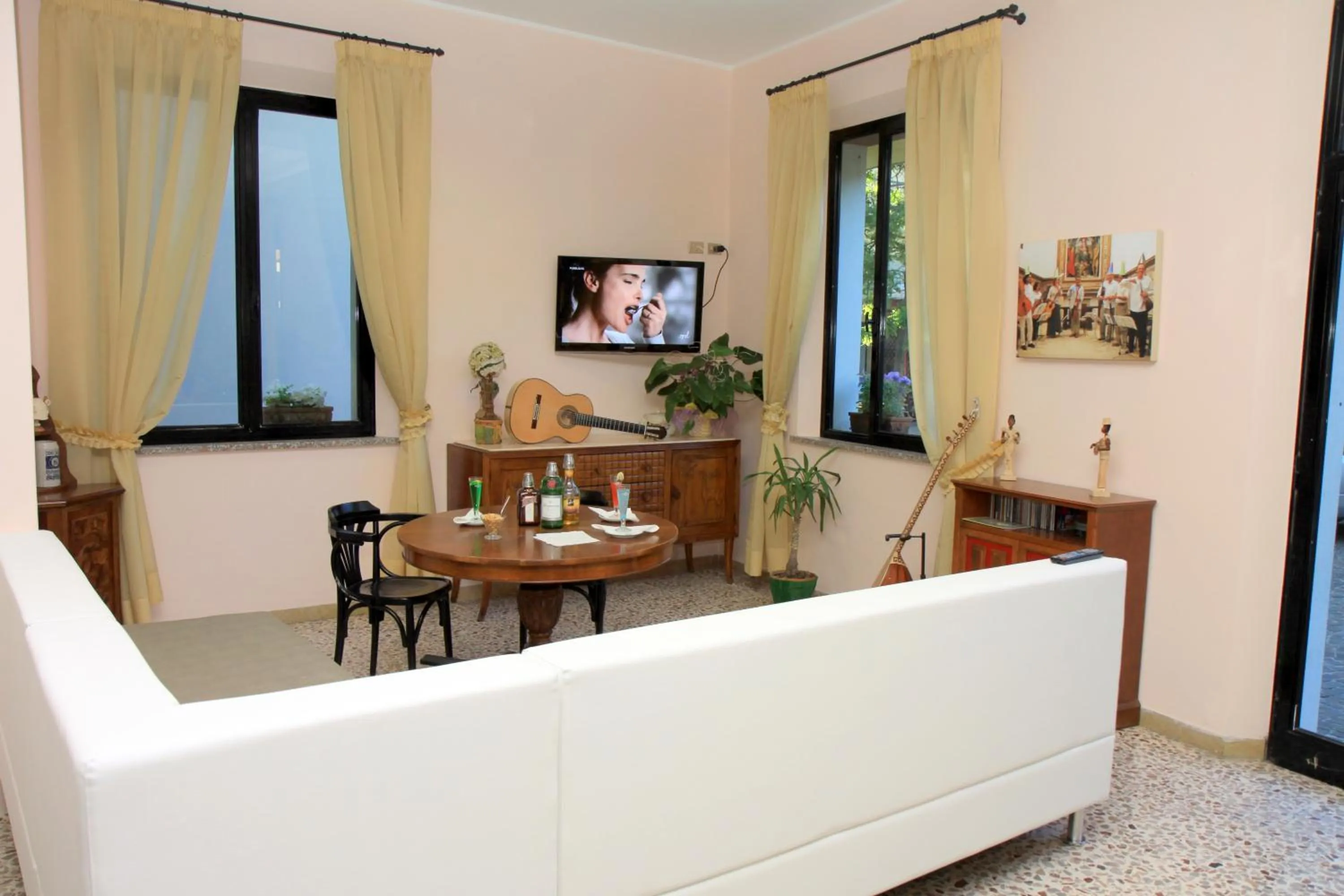 Communal lounge/ TV room in Hotel Azzurra