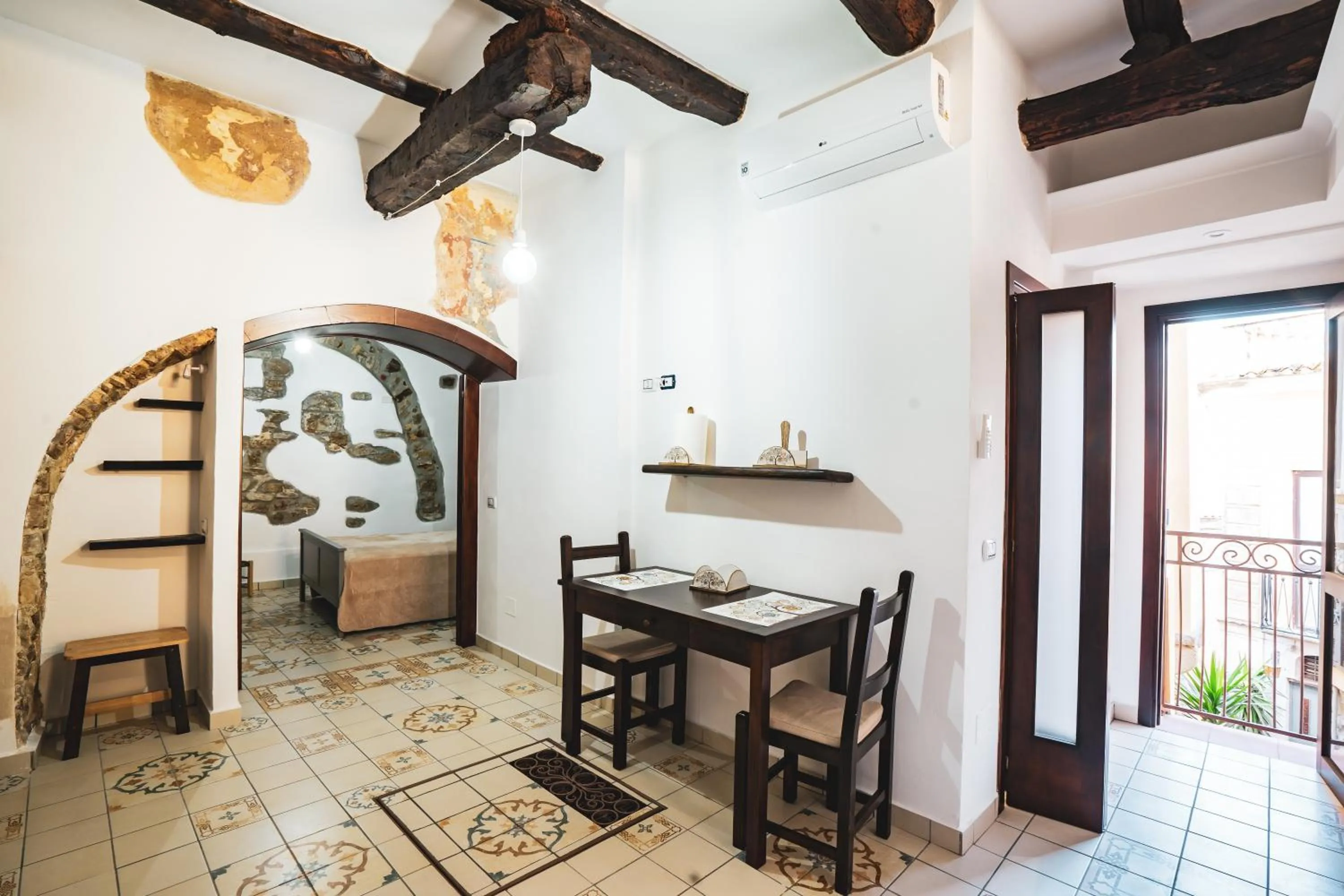 Photo of the whole room in Borgo Dei Saraceni - Suites & Apartments