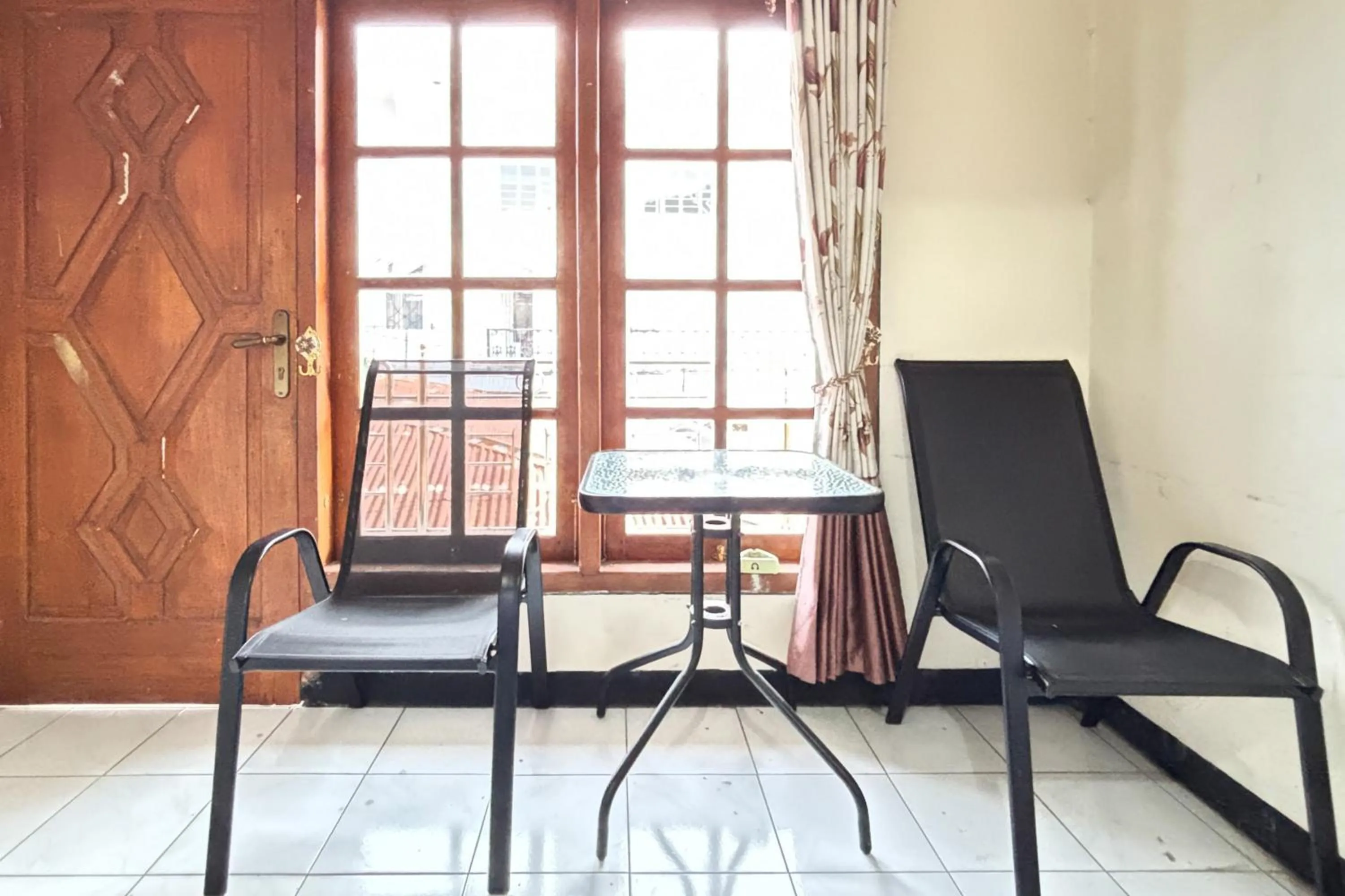 Seating area in RedDoorz near Sarangan Lake