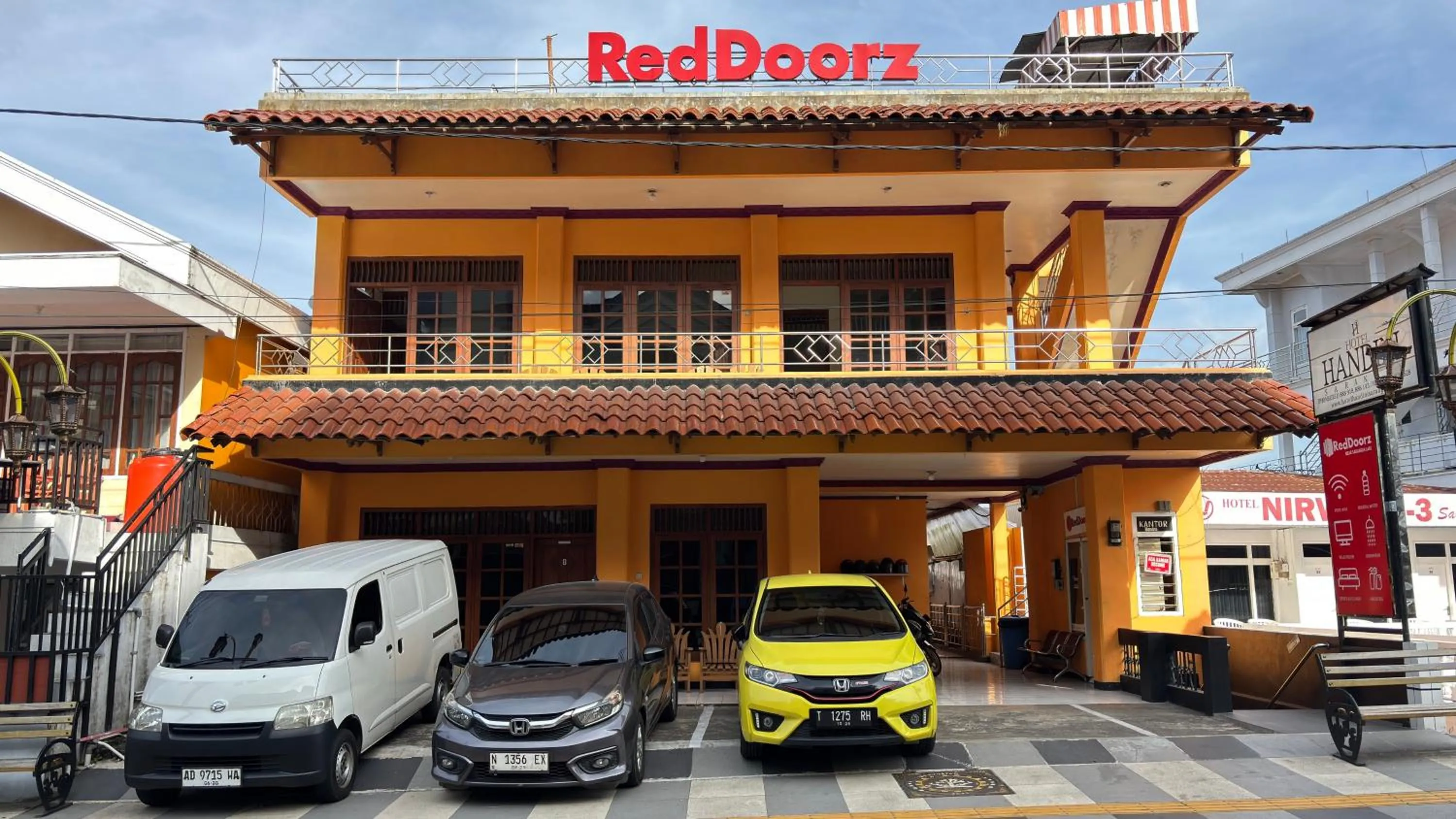 Facade/entrance in RedDoorz near Sarangan Lake