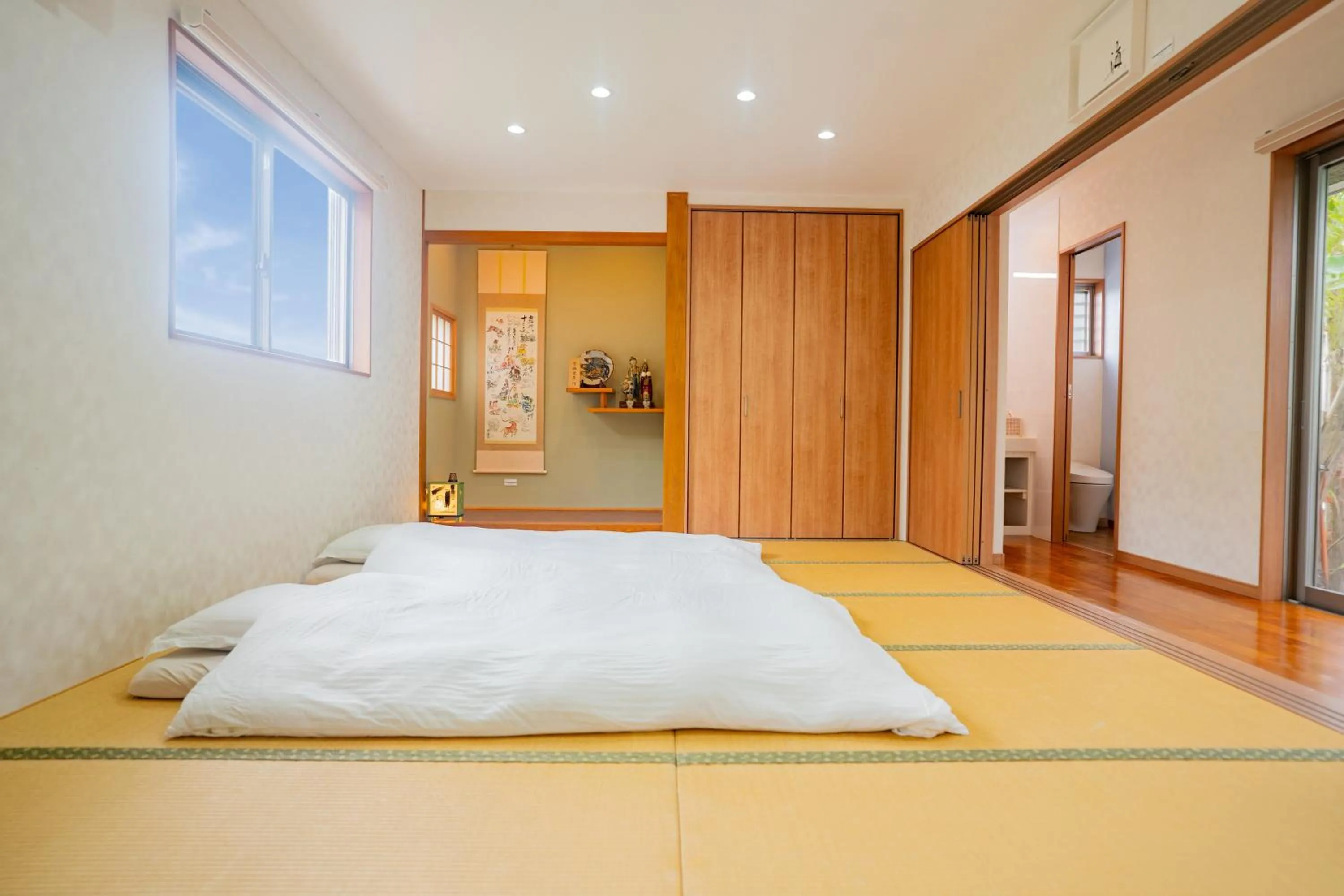Bed in Yamagata Ryukyu Hatago Onnason with pool