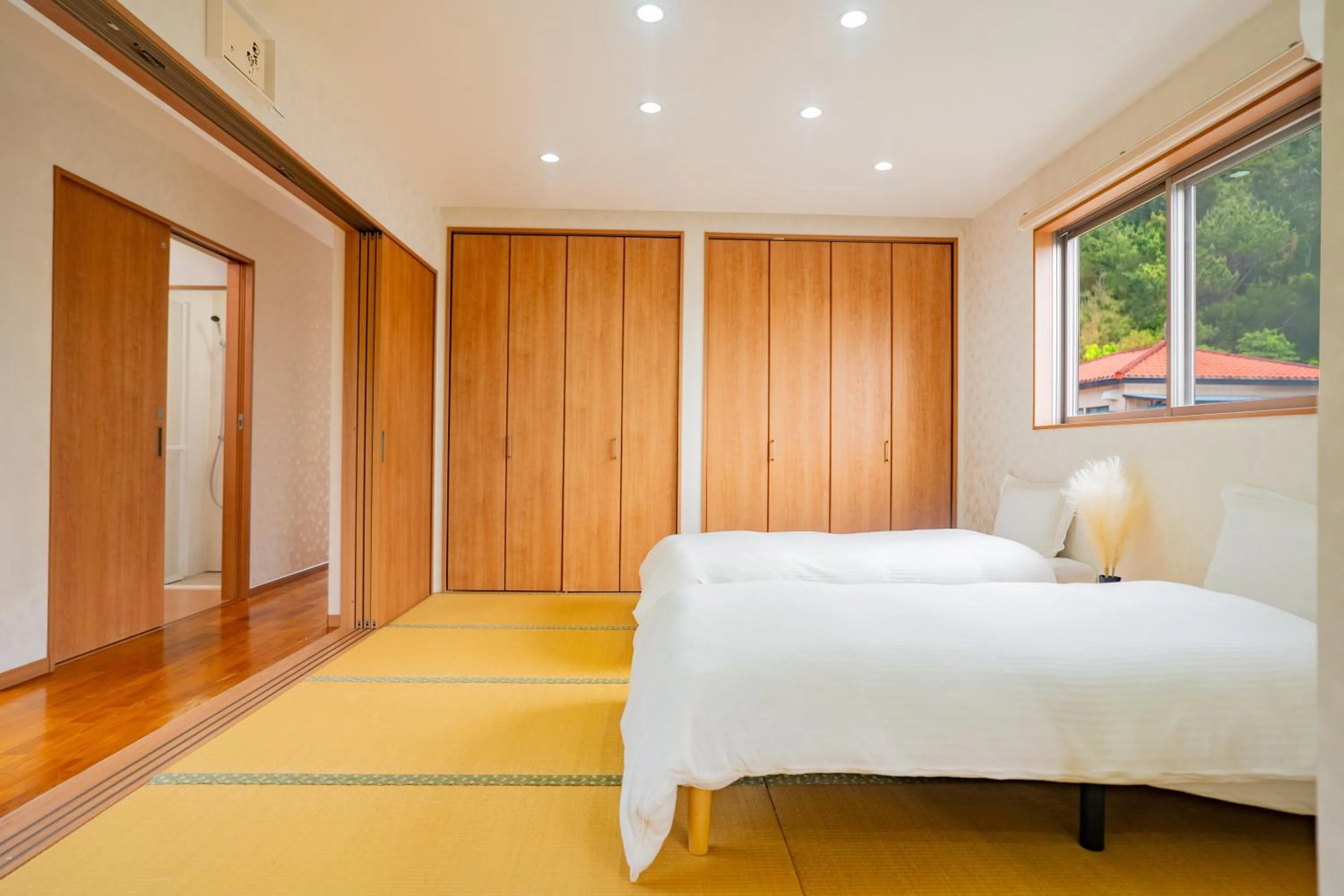 Bed in Yamagata Ryukyu Hatago Onnason with pool
