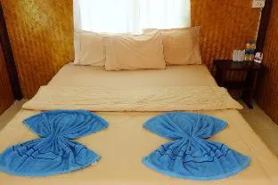 Bed in Koh kood Neverland beach resort