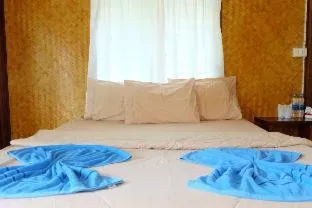 Bed in Koh kood Neverland beach resort