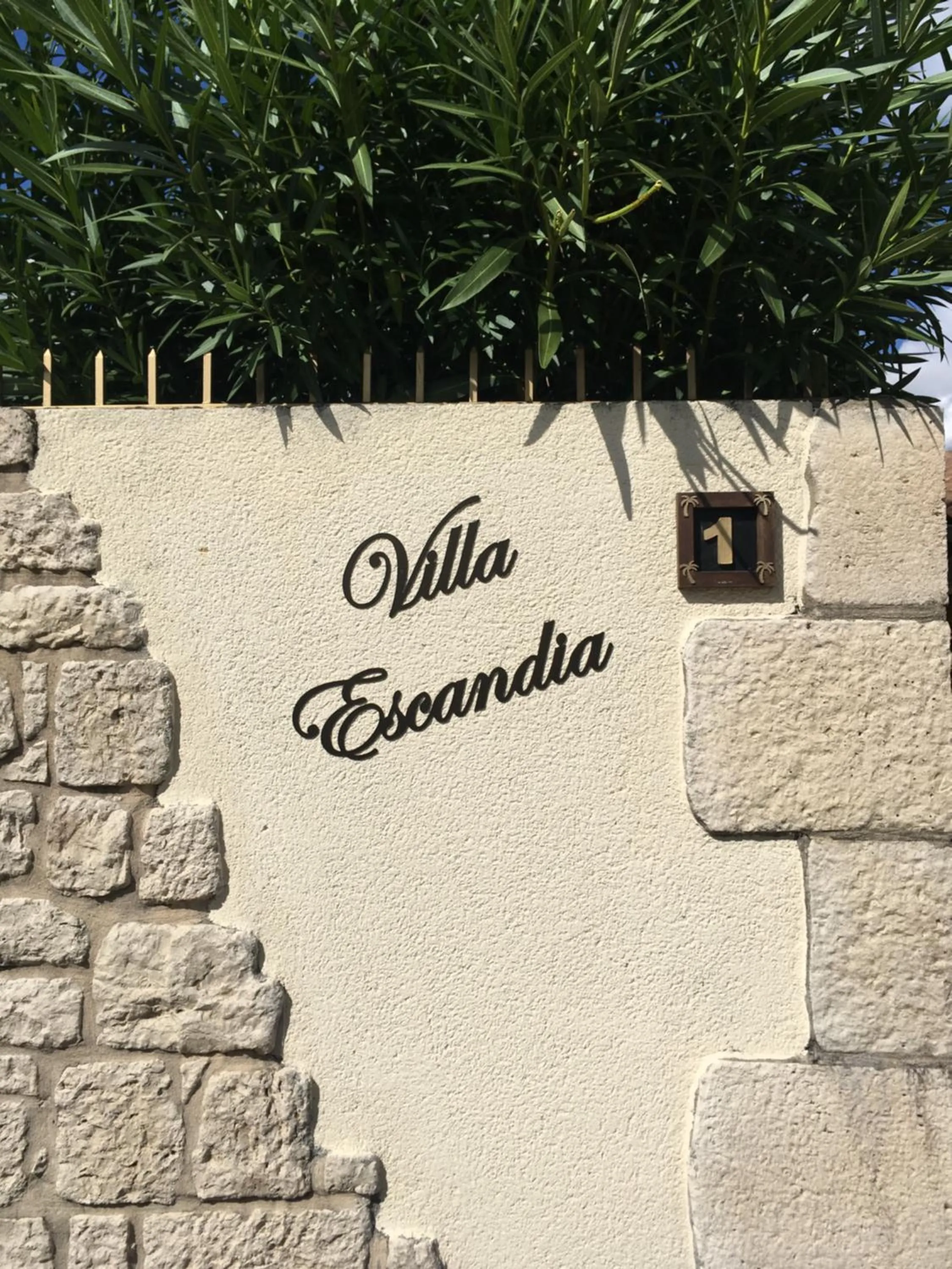 Property logo or sign in Villa Escandia