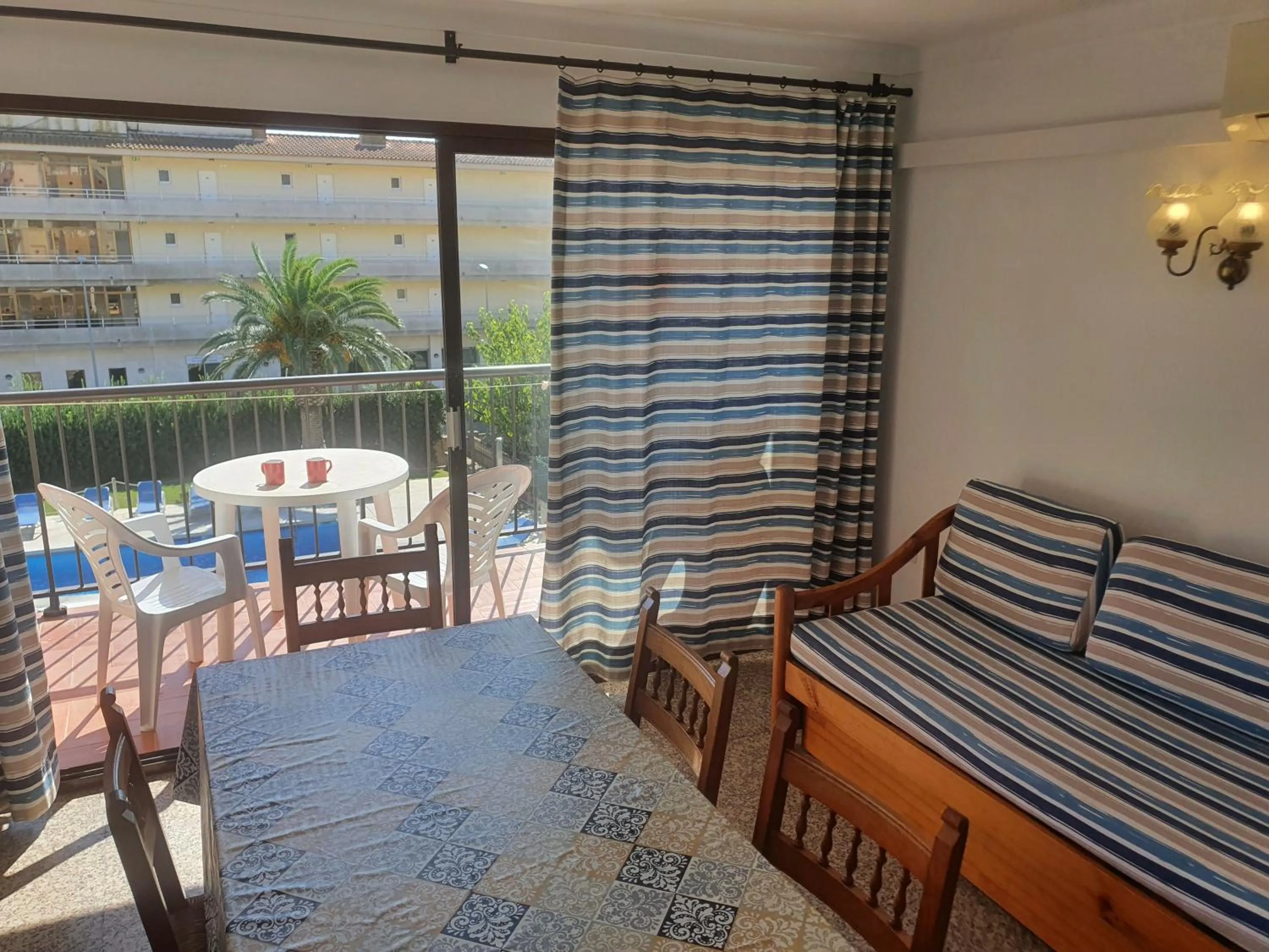 Living room, Bed in Payet Apartments