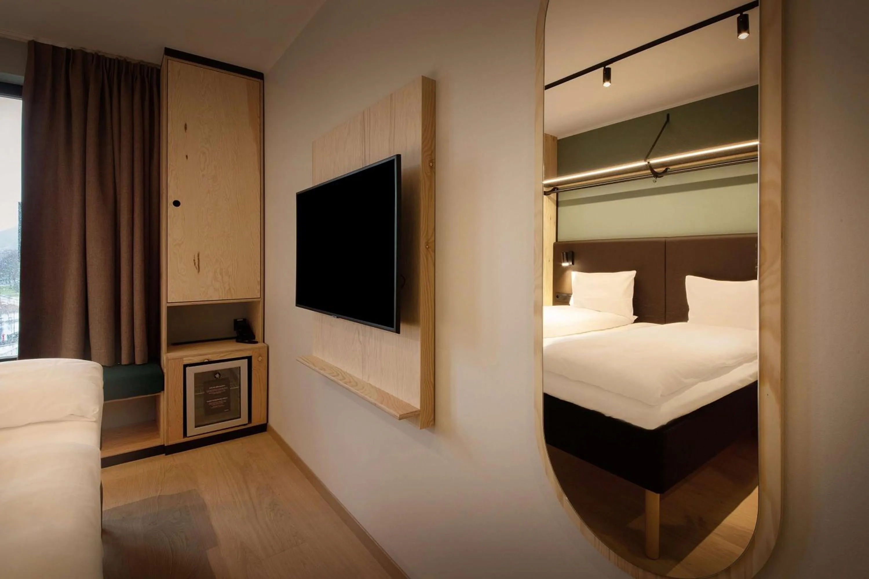 Photo of the whole room, Bed in Scandic Voss