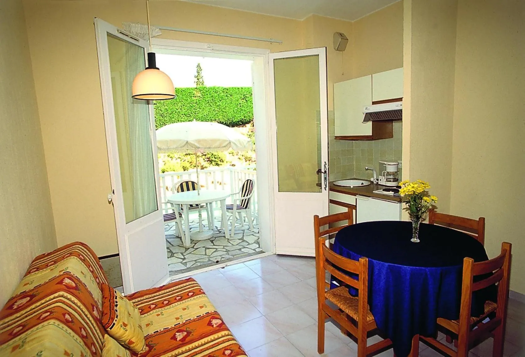Kitchen or kitchenette in Hôtel Lou Paouvadou