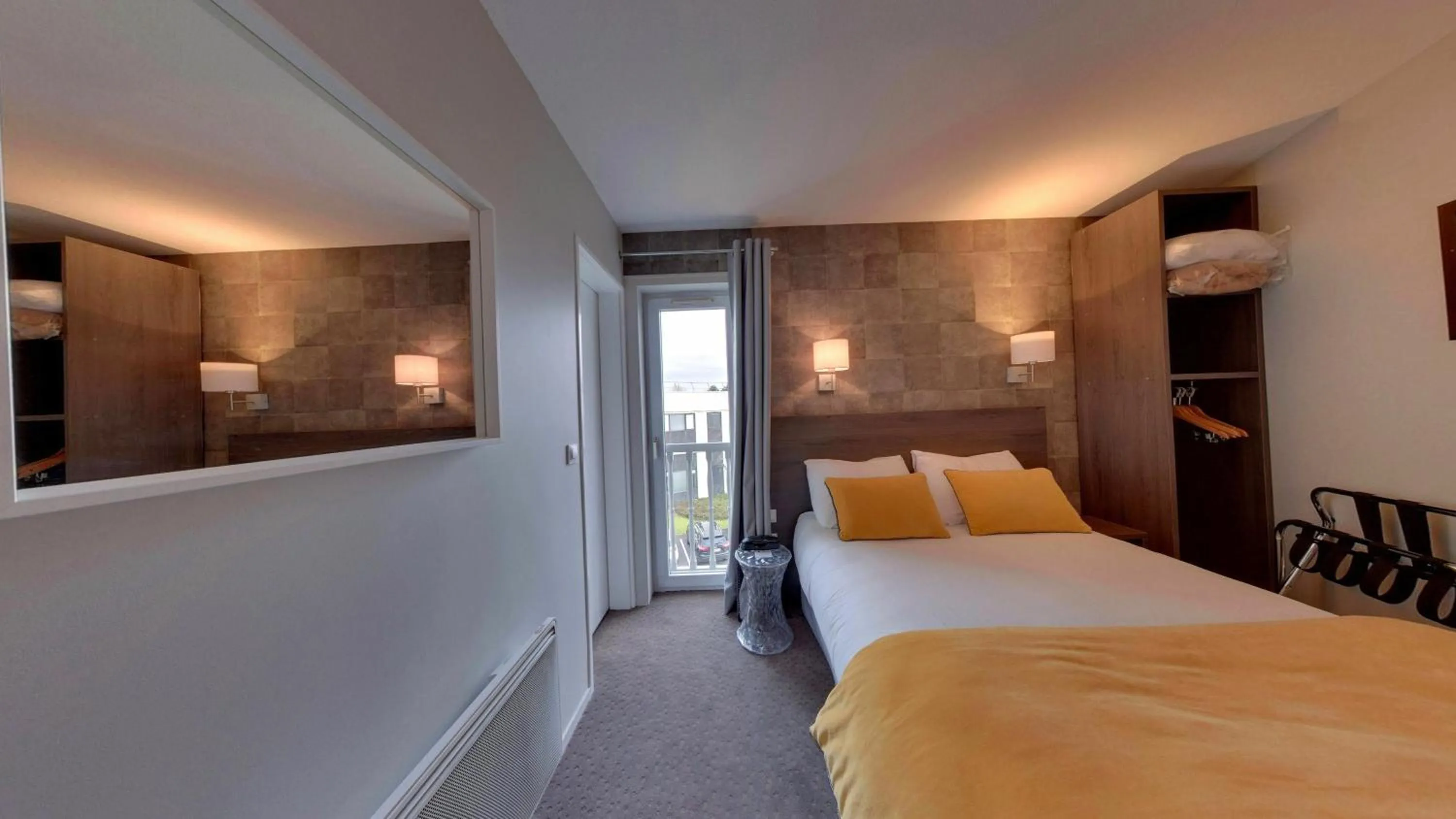 Photo of the whole room, Bed in Hotel Acadie Les Ulis