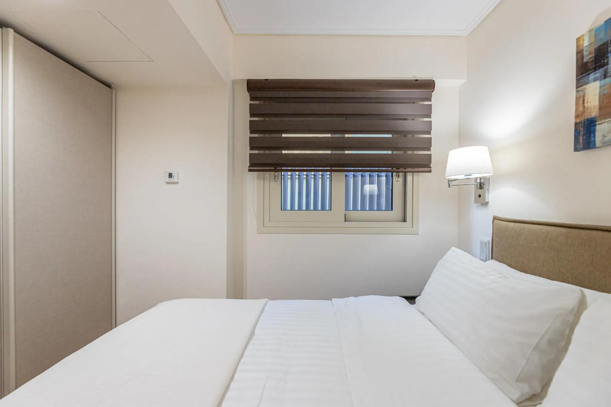 Bed in Olygreen Athens Residences