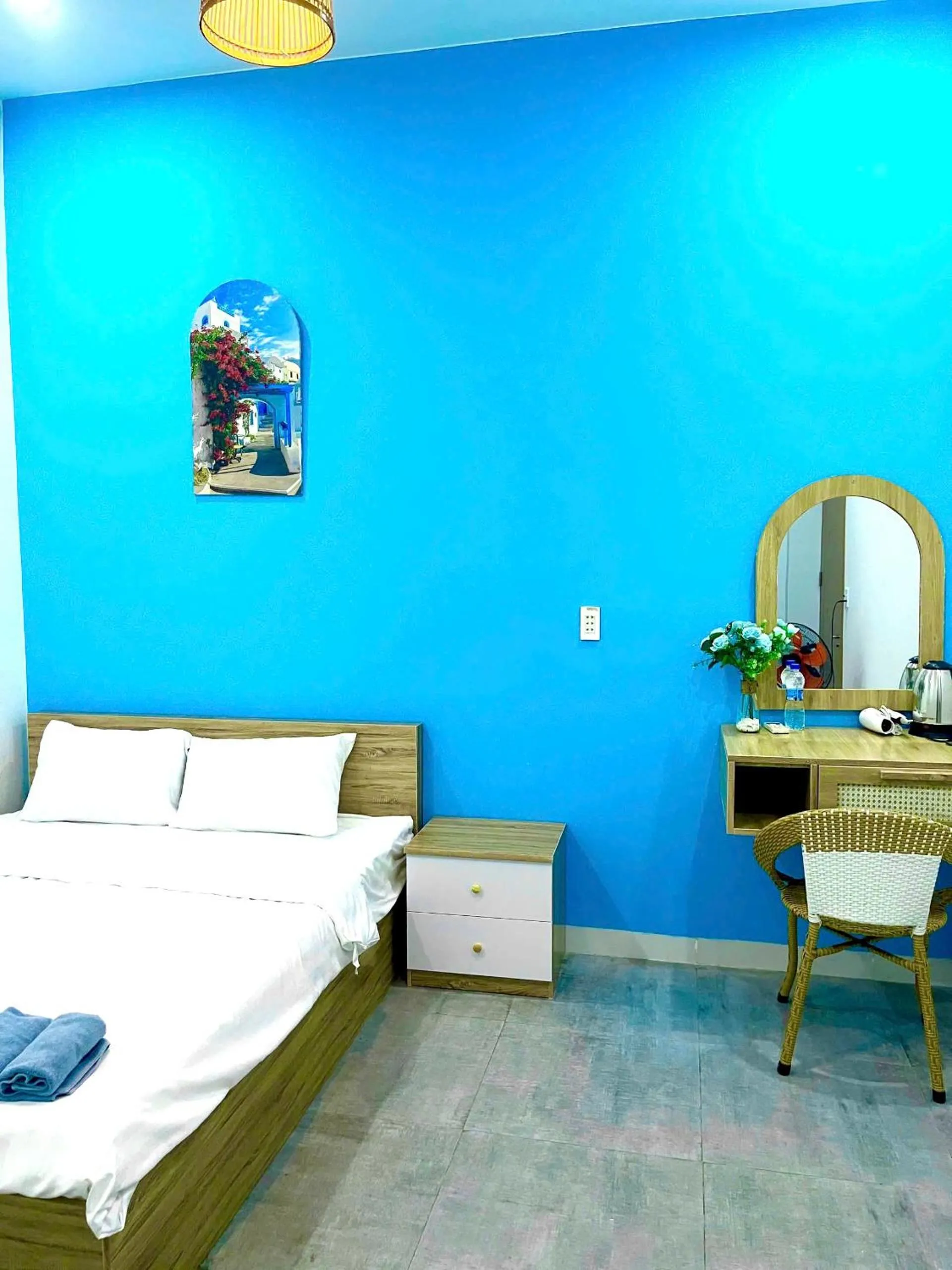 Bed in Santorini House and Coffee