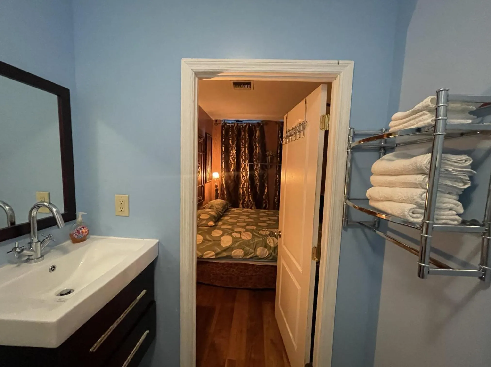 Shower, Bed in NYC Townhouse Apartment