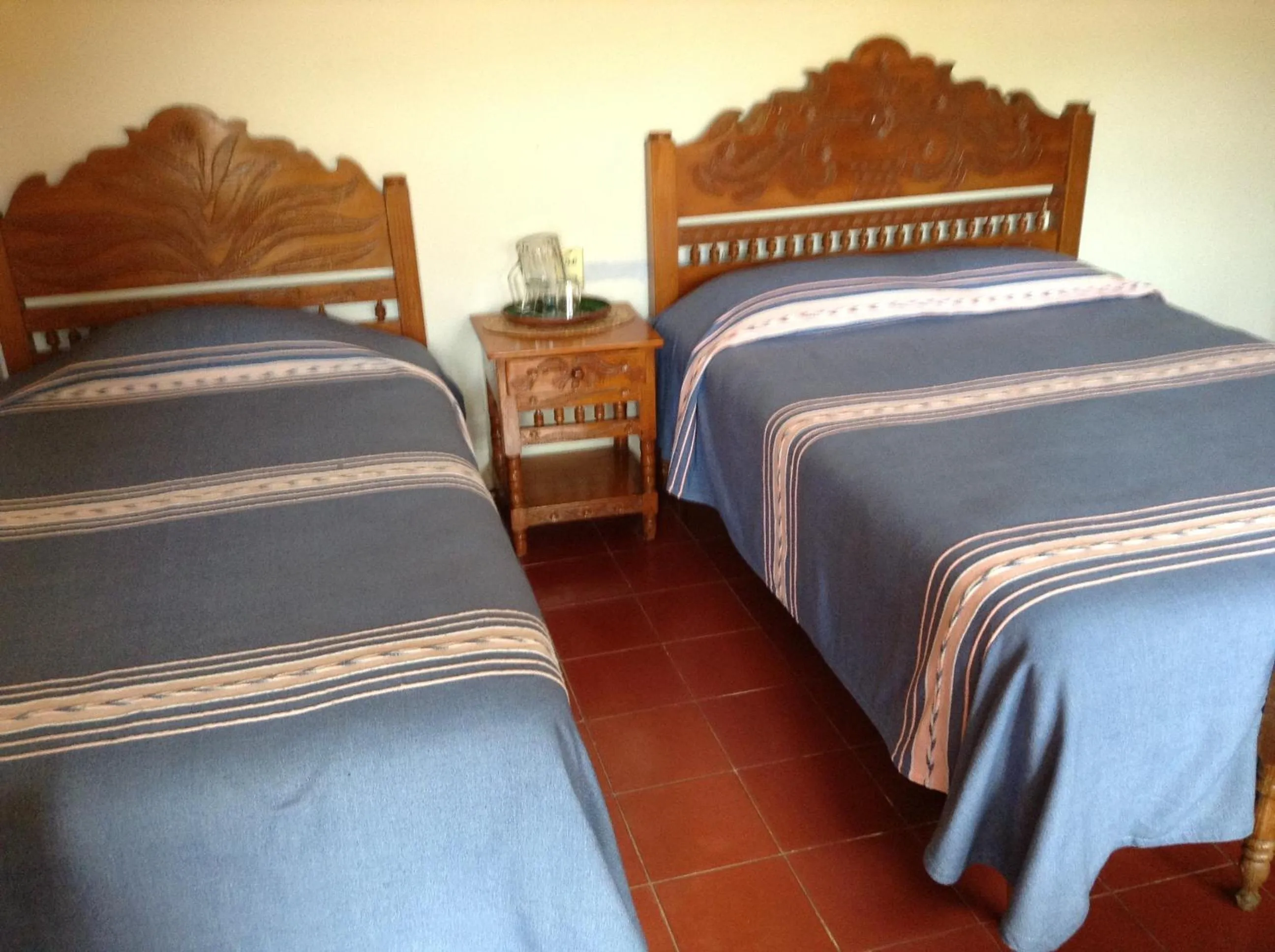 Bed in Posada de la Salud