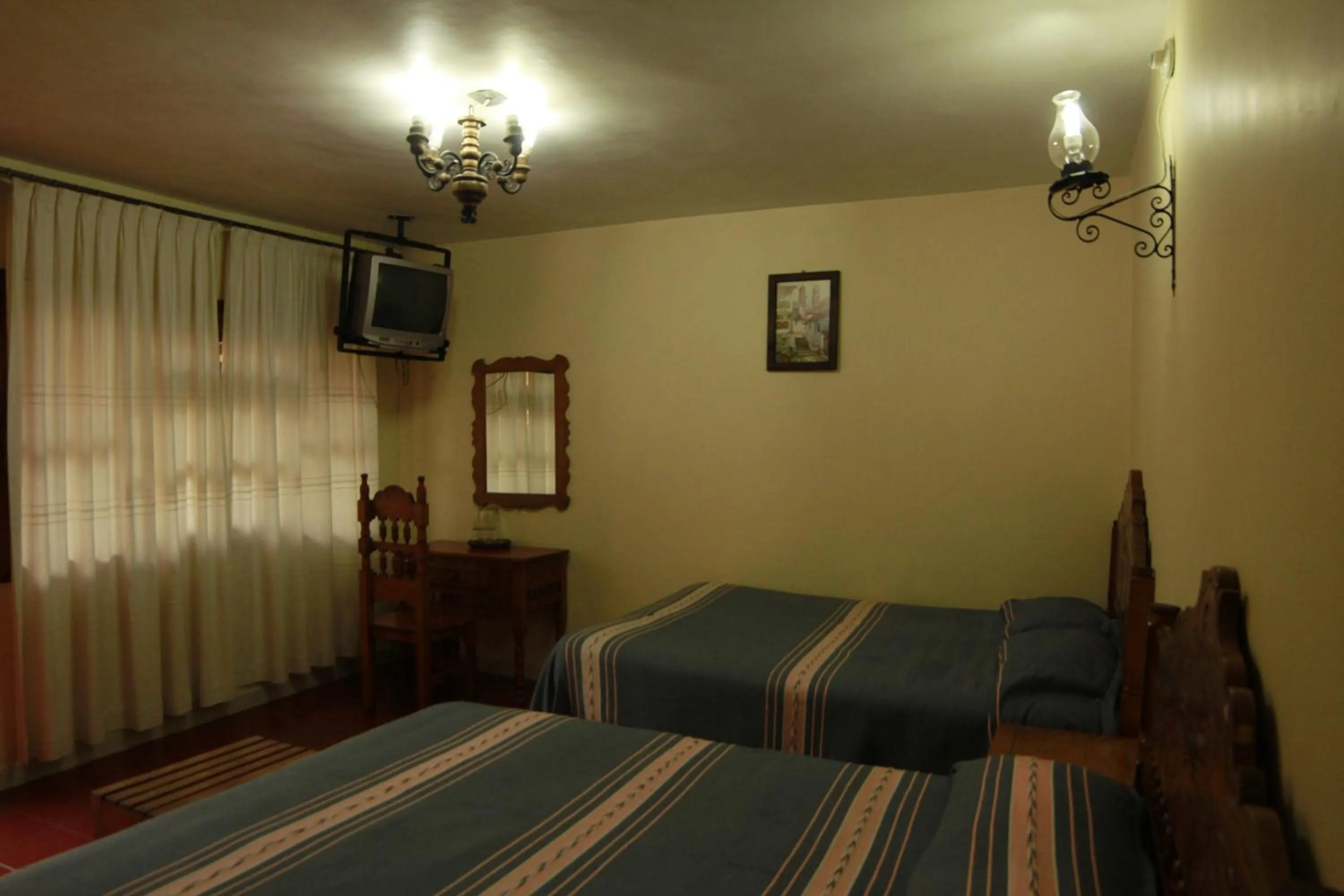 Bed in Posada de la Salud