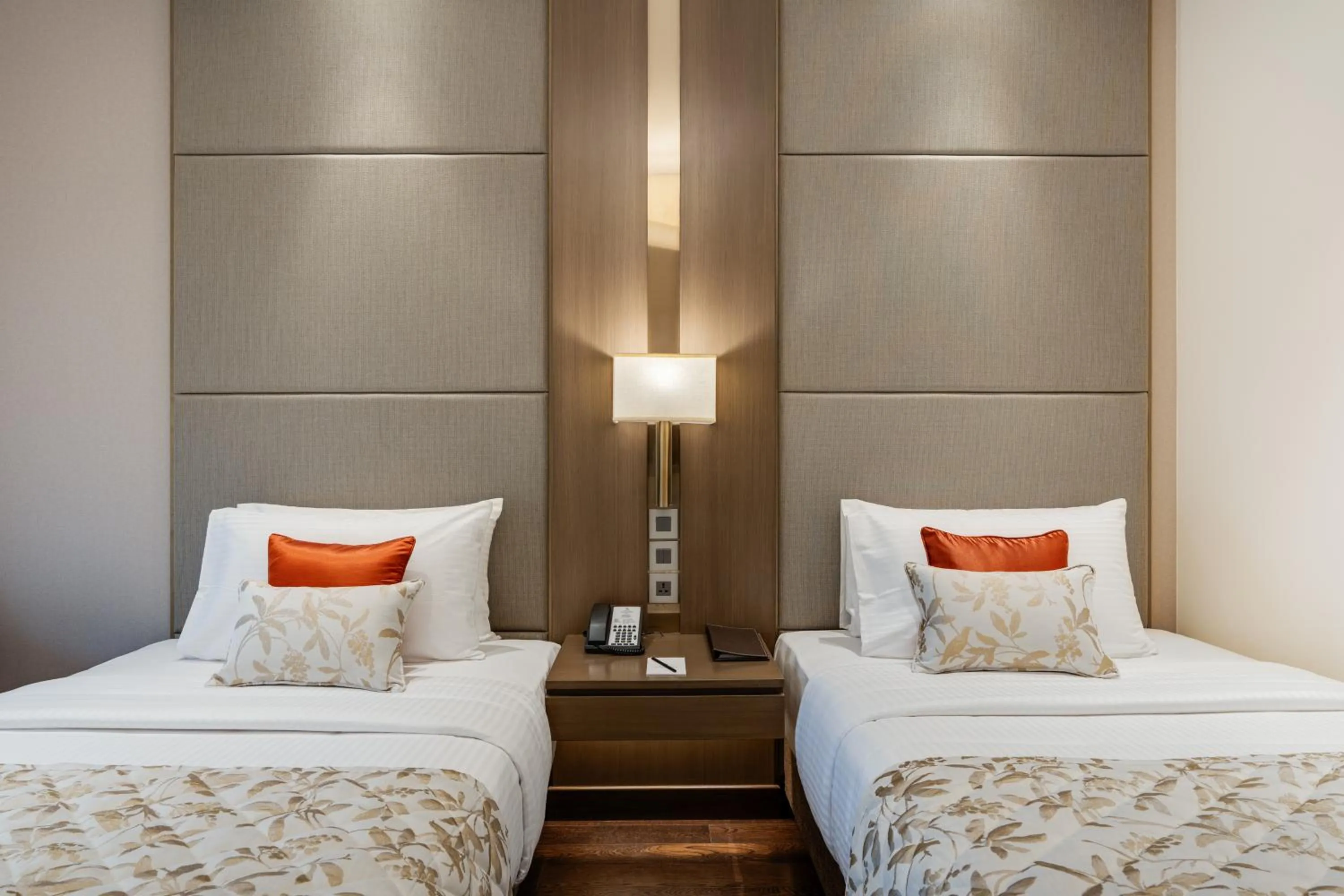 Bed in Palm Meadows Resort