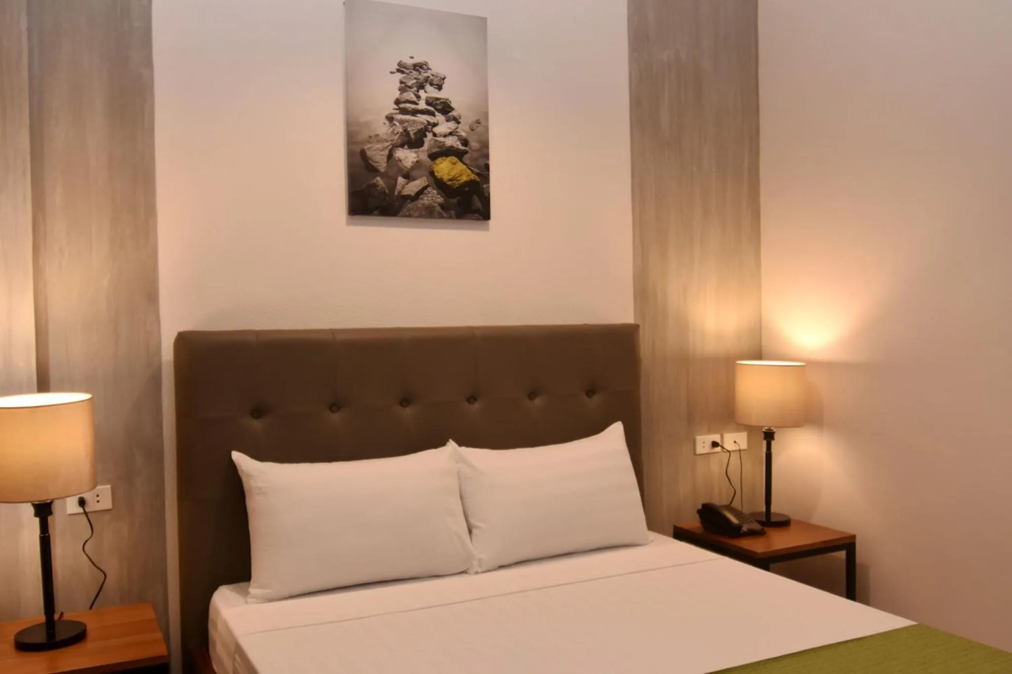Bed in Andeo Suites