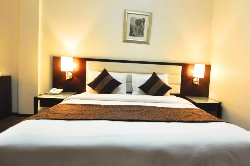 Bed in Phoenicia Grand Hotel