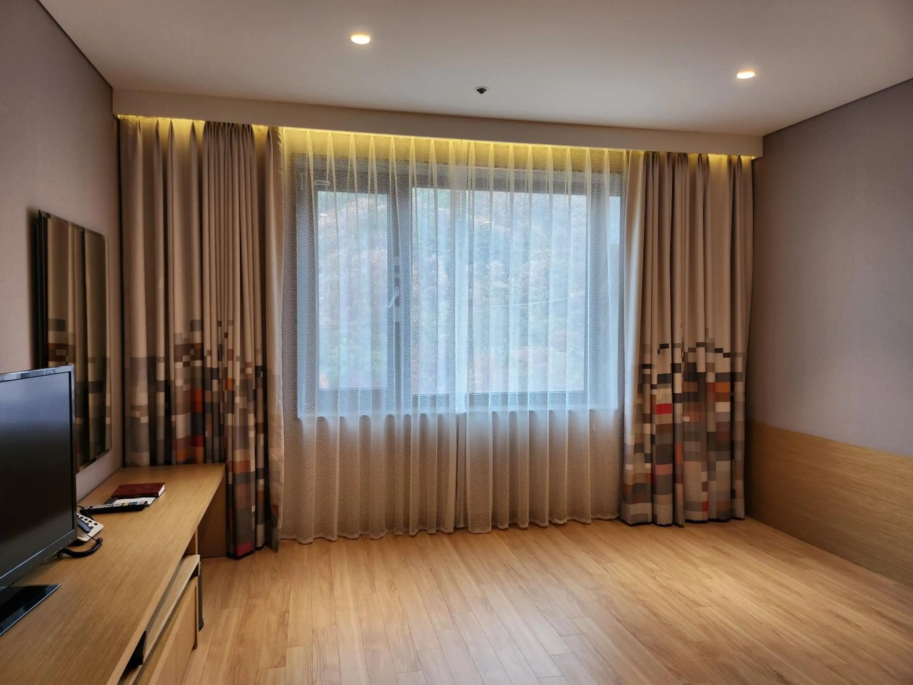 Bedroom in Mudeung Park Hotel