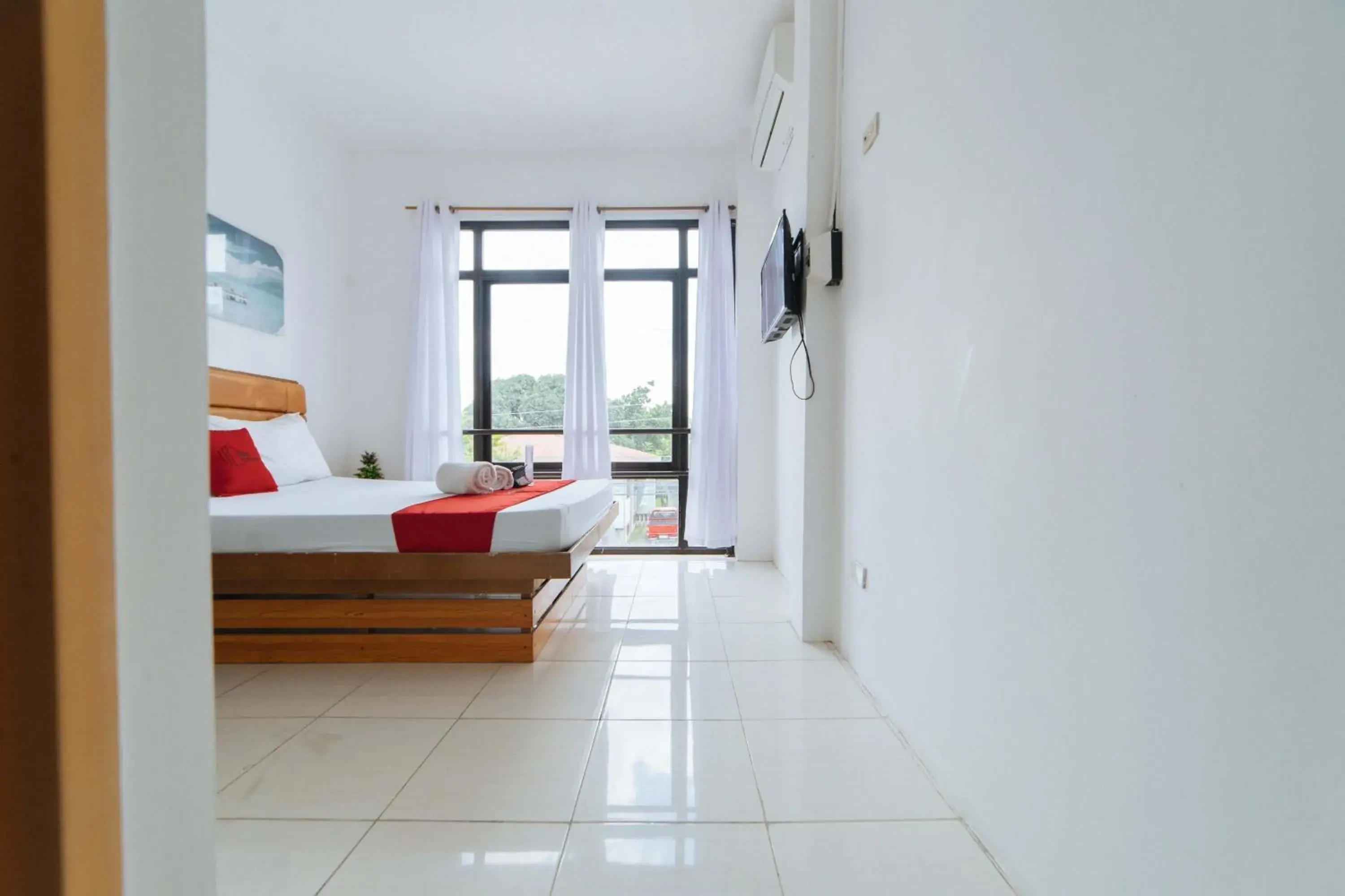 Photo of the whole room, Bed in RedDoorz Plus near Dadiangas Heights Photo of the whole room, Bed in RedDoorz Plus near Dadiangas Heights