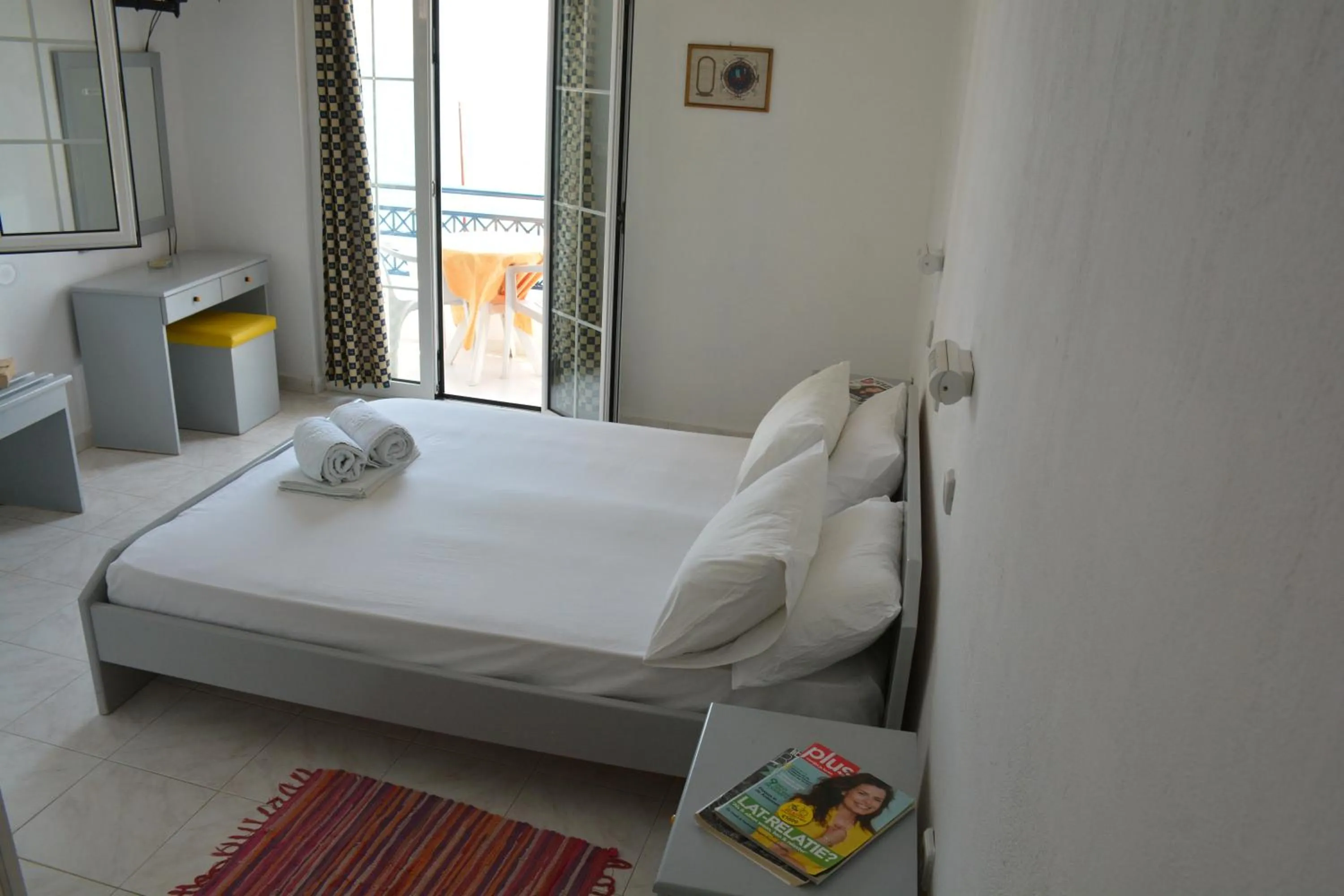 Property building, Bed in Paradise Studios