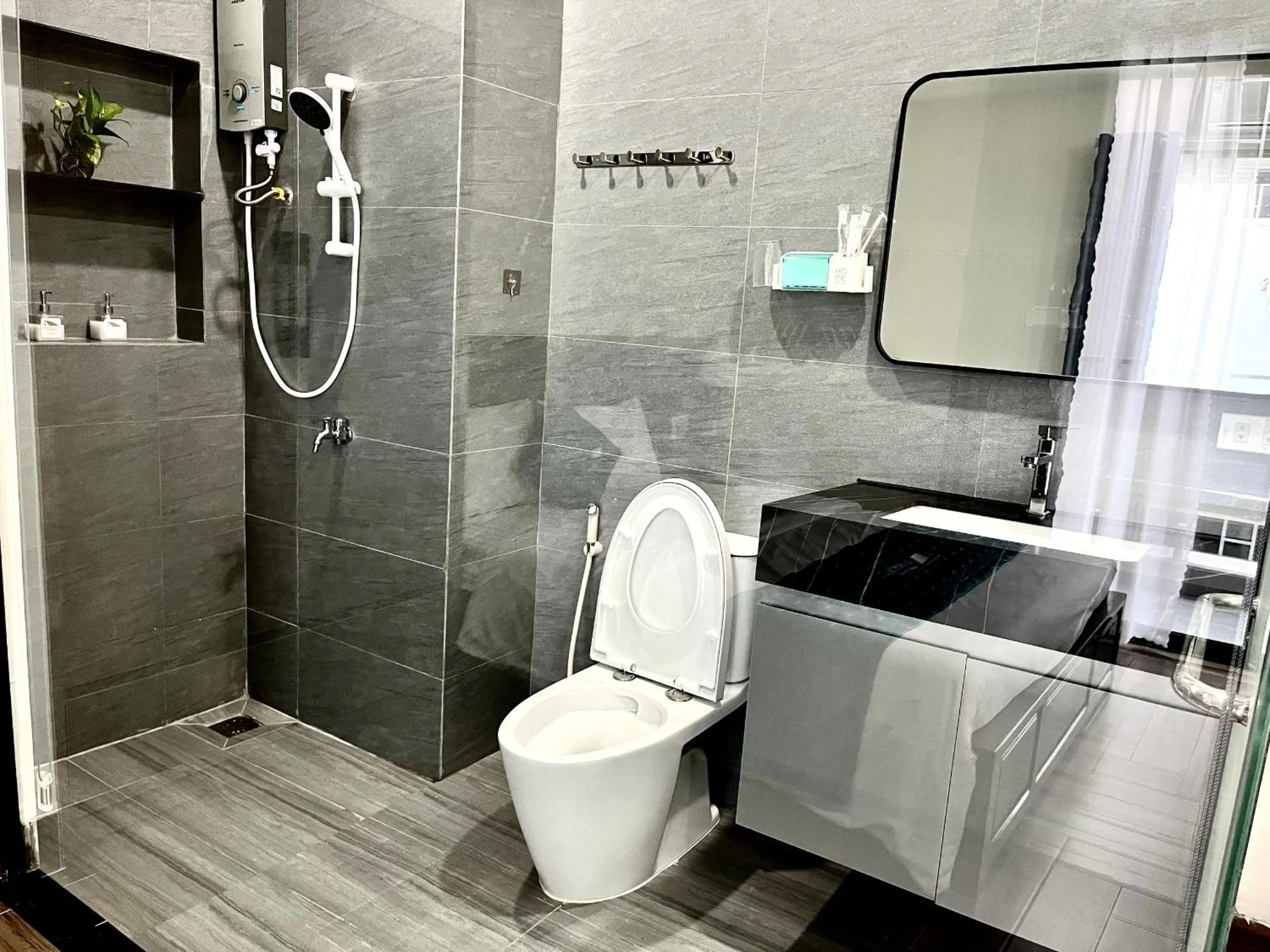 Bathroom in Le House Hotel and Studio