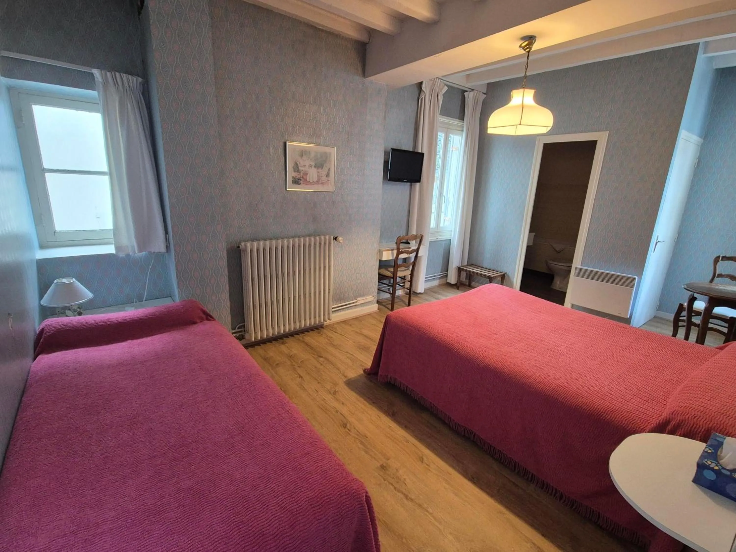 Bed in Hotel Saint Jean