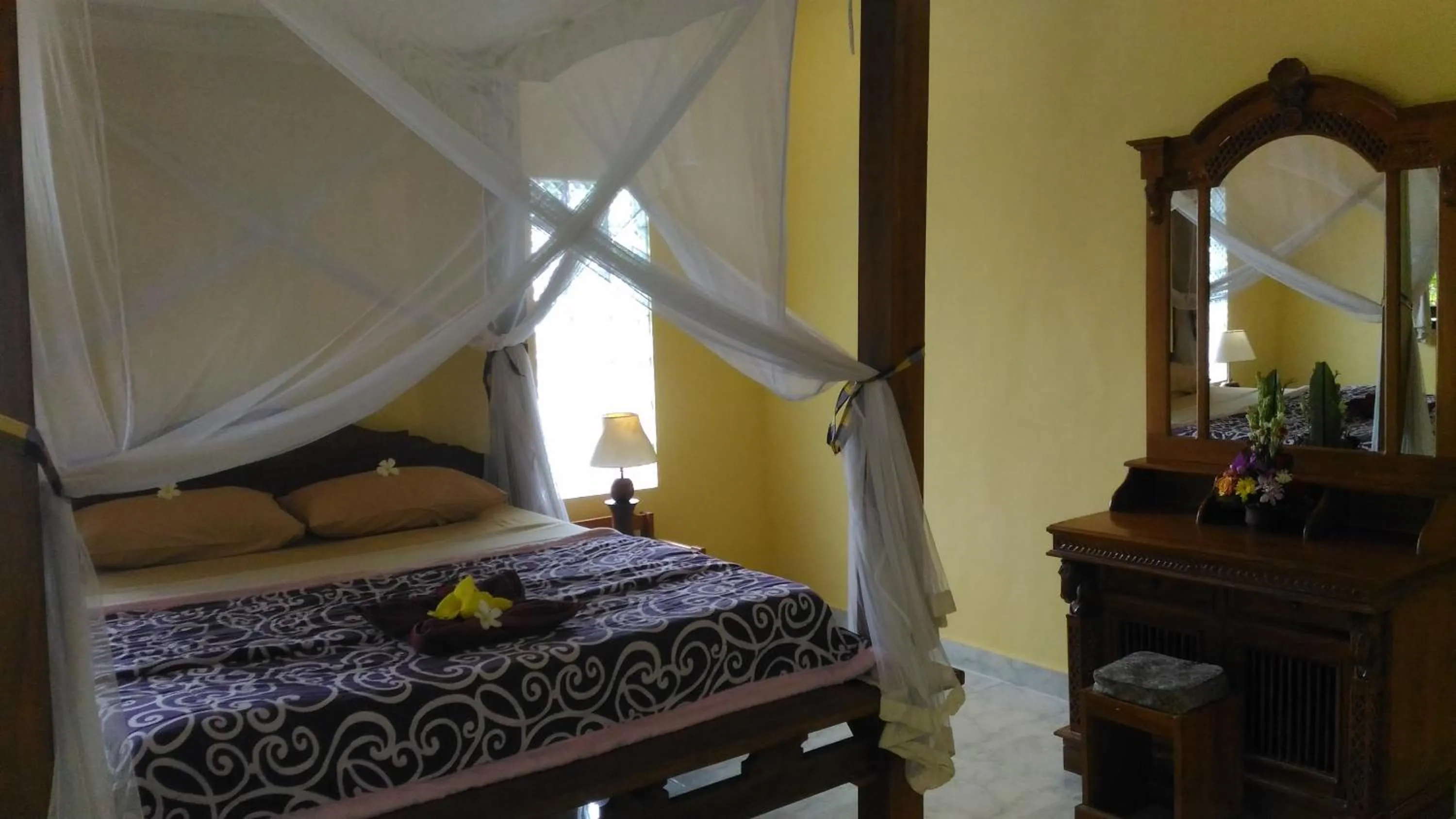 Bed in Arjana Bungalows 2