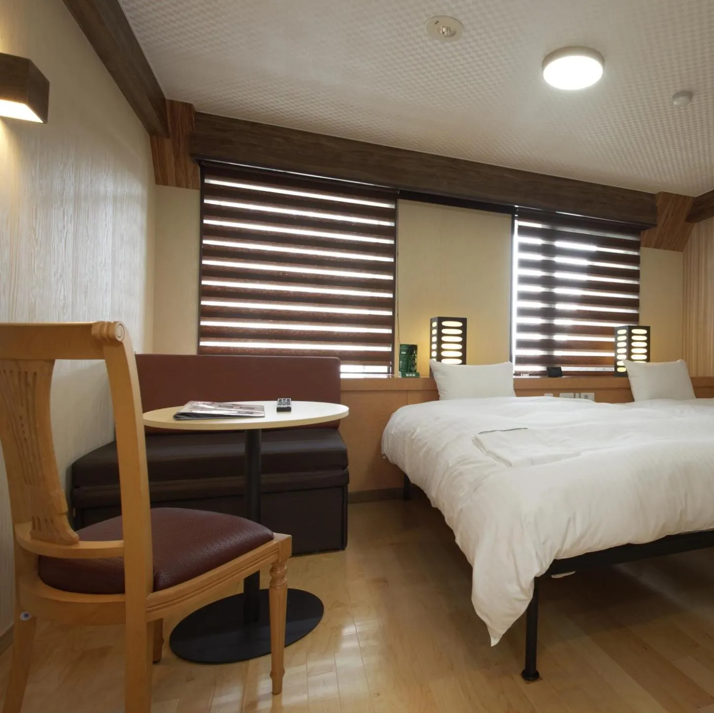 Bed in PACIFICO Hotel and Spa