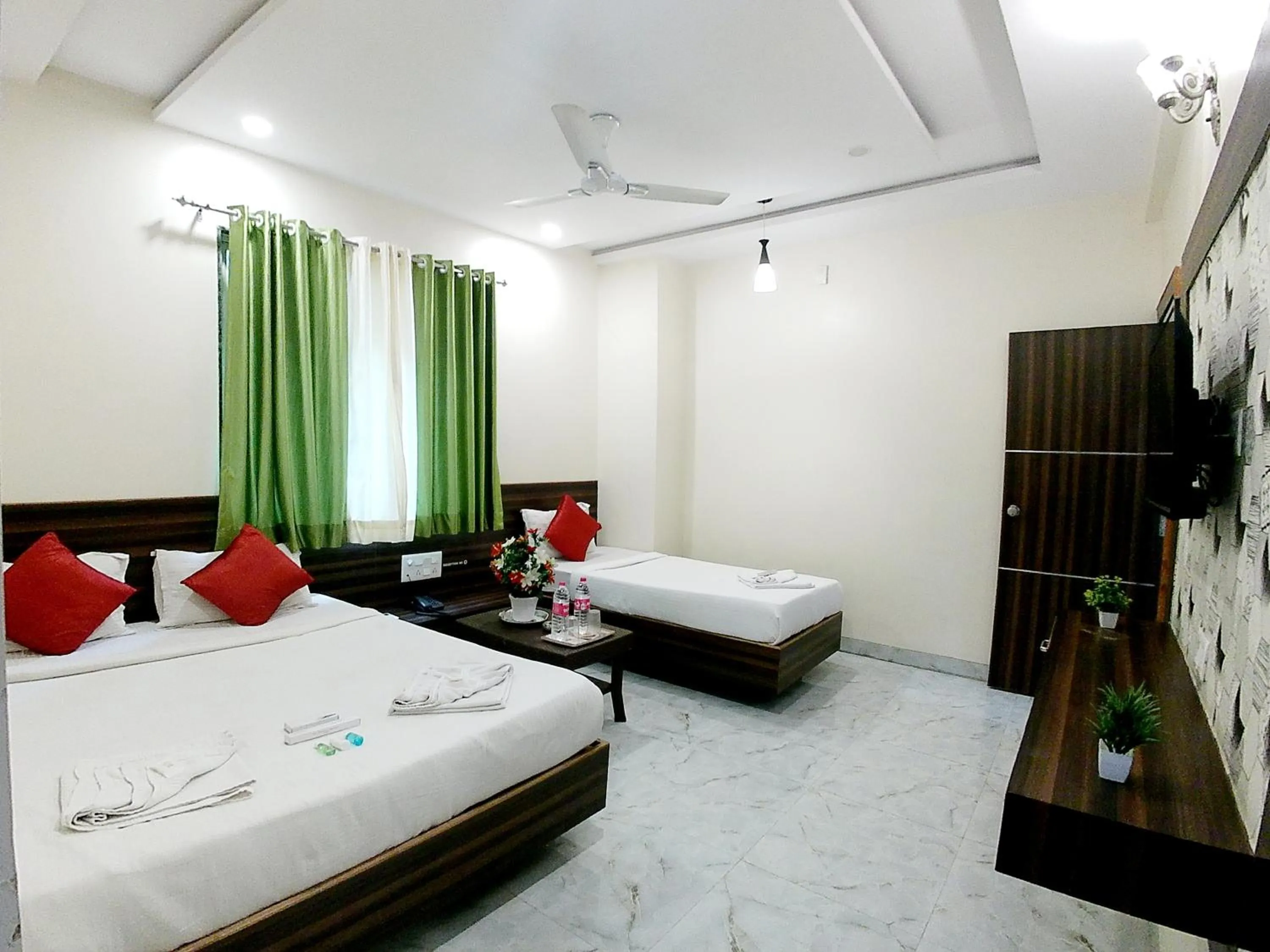 Bed in Hotel Sai SK Palace